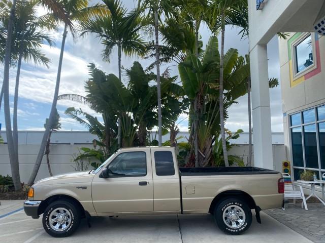 2002 Harvest Gold Metallic /Med Prairie Tan Ford Ranger XLT LOW MILES 62,461 1 OWNER (1FTYR44U32P) with an 3.0L SEFI V6 Engine engine, Automatic transmission, located at 4701 North Dixie Hwy, Pompano Beach, FL, 33064, (954) 422-2889, 26.240938, -80.123474 - OUR WEBPAGE FLORIDACARS1.COM HAS OVER 100 PHOTOS AND FREE CARFAX LINK 2002 FORD RANGER XLT APPEARANCE 1 OWNER VIN: 1FTYR44U32PA13610 1 F T Y R 4 4 U 3 2 P A 1 3 6 1 0 4 DOOR EXTENDED CAB PICKUP 3.0L V6 F OHV GASOLINE 22 MPG REAR WHEEL DRIVE Features ABS Brakes Air Conditioning AM/FM Stereo Bed Liner - Photo#4