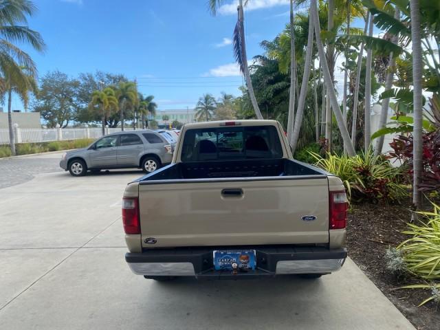 2002 Harvest Gold Metallic /Med Prairie Tan Ford Ranger XLT LOW MILES 62,461 1 OWNER (1FTYR44U32P) with an 3.0L SEFI V6 Engine engine, Automatic transmission, located at 4701 North Dixie Hwy, Pompano Beach, FL, 33064, (954) 422-2889, 26.240938, -80.123474 - OUR WEBPAGE FLORIDACARS1.COM HAS OVER 100 PHOTOS AND FREE CARFAX LINK 2002 FORD RANGER XLT APPEARANCE 1 OWNER VIN: 1FTYR44U32PA13610 1 F T Y R 4 4 U 3 2 P A 1 3 6 1 0 4 DOOR EXTENDED CAB PICKUP 3.0L V6 F OHV GASOLINE 22 MPG REAR WHEEL DRIVE Features ABS Brakes Air Conditioning AM/FM Stereo Bed Liner - Photo#6