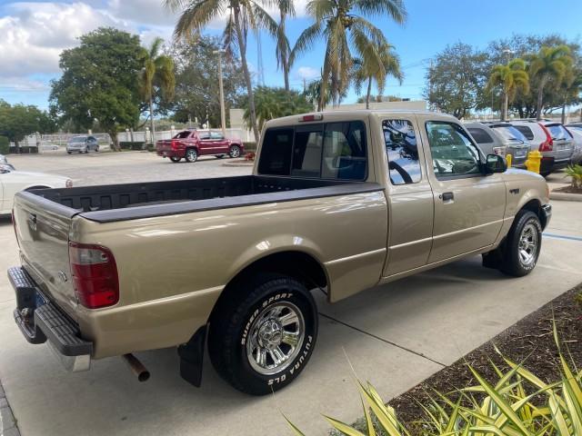 2002 Harvest Gold Metallic /Med Prairie Tan Ford Ranger XLT LOW MILES 62,461 1 OWNER (1FTYR44U32P) with an 3.0L SEFI V6 Engine engine, Automatic transmission, located at 4701 North Dixie Hwy, Pompano Beach, FL, 33064, (954) 422-2889, 26.240938, -80.123474 - OUR WEBPAGE FLORIDACARS1.COM HAS OVER 100 PHOTOS AND FREE CARFAX LINK 2002 FORD RANGER XLT APPEARANCE 1 OWNER VIN: 1FTYR44U32PA13610 1 F T Y R 4 4 U 3 2 P A 1 3 6 1 0 4 DOOR EXTENDED CAB PICKUP 3.0L V6 F OHV GASOLINE 22 MPG REAR WHEEL DRIVE Features ABS Brakes Air Conditioning AM/FM Stereo Bed Liner - Photo#7