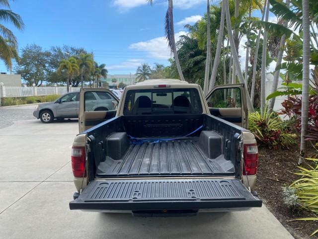 2002 Harvest Gold Metallic /Med Prairie Tan Ford Ranger XLT LOW MILES 62,461 1 OWNER (1FTYR44U32P) with an 3.0L SEFI V6 Engine engine, Automatic transmission, located at 4701 North Dixie Hwy, Pompano Beach, FL, 33064, (954) 422-2889, 26.240938, -80.123474 - OUR WEBPAGE FLORIDACARS1.COM HAS OVER 100 PHOTOS AND FREE CARFAX LINK 2002 FORD RANGER XLT APPEARANCE 1 OWNER VIN: 1FTYR44U32PA13610 1 F T Y R 4 4 U 3 2 P A 1 3 6 1 0 4 DOOR EXTENDED CAB PICKUP 3.0L V6 F OHV GASOLINE 22 MPG REAR WHEEL DRIVE Features ABS Brakes Air Conditioning AM/FM Stereo Bed Liner - Photo#15