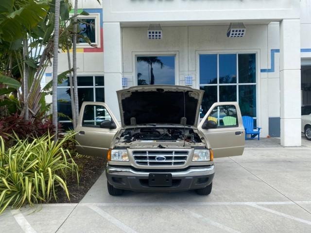 2002 Harvest Gold Metallic /Med Prairie Tan Ford Ranger XLT LOW MILES 62,461 1 OWNER (1FTYR44U32P) with an 3.0L SEFI V6 Engine engine, Automatic transmission, located at 4701 North Dixie Hwy, Pompano Beach, FL, 33064, (954) 422-2889, 26.240938, -80.123474 - OUR WEBPAGE FLORIDACARS1.COM HAS OVER 100 PHOTOS AND FREE CARFAX LINK 2002 FORD RANGER XLT APPEARANCE 1 OWNER VIN: 1FTYR44U32PA13610 1 F T Y R 4 4 U 3 2 P A 1 3 6 1 0 4 DOOR EXTENDED CAB PICKUP 3.0L V6 F OHV GASOLINE 22 MPG REAR WHEEL DRIVE Features ABS Brakes Air Conditioning AM/FM Stereo Bed Liner - Photo#16