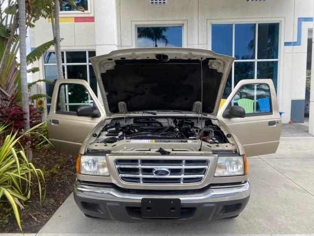 2002 Harvest Gold Metallic /Med Prairie Tan Ford Ranger XLT LOW MILES 62,461 1 OWNER (1FTYR44U32P) with an 3.0L SEFI V6 Engine engine, Automatic transmission, located at 4701 North Dixie Hwy, Pompano Beach, FL, 33064, (954) 422-2889, 26.240938, -80.123474 - OUR WEBPAGE FLORIDACARS1.COM HAS OVER 100 PHOTOS AND FREE CARFAX LINK 2002 FORD RANGER XLT APPEARANCE 1 OWNER VIN: 1FTYR44U32PA13610 1 F T Y R 4 4 U 3 2 P A 1 3 6 1 0 4 DOOR EXTENDED CAB PICKUP 3.0L V6 F OHV GASOLINE 22 MPG REAR WHEEL DRIVE Features ABS Brakes Air Conditioning AM/FM Stereo Bed Liner - Photo#17