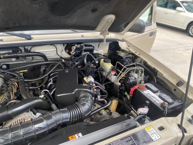 2002 Harvest Gold Metallic /Med Prairie Tan Ford Ranger XLT LOW MILES 62,461 1 OWNER (1FTYR44U32P) with an 3.0L SEFI V6 Engine engine, Automatic transmission, located at 4701 North Dixie Hwy, Pompano Beach, FL, 33064, (954) 422-2889, 26.240938, -80.123474 - OUR WEBPAGE FLORIDACARS1.COM HAS OVER 100 PHOTOS AND FREE CARFAX LINK 2002 FORD RANGER XLT APPEARANCE 1 OWNER VIN: 1FTYR44U32PA13610 1 F T Y R 4 4 U 3 2 P A 1 3 6 1 0 4 DOOR EXTENDED CAB PICKUP 3.0L V6 F OHV GASOLINE 22 MPG REAR WHEEL DRIVE Features ABS Brakes Air Conditioning AM/FM Stereo Bed Liner - Photo#25