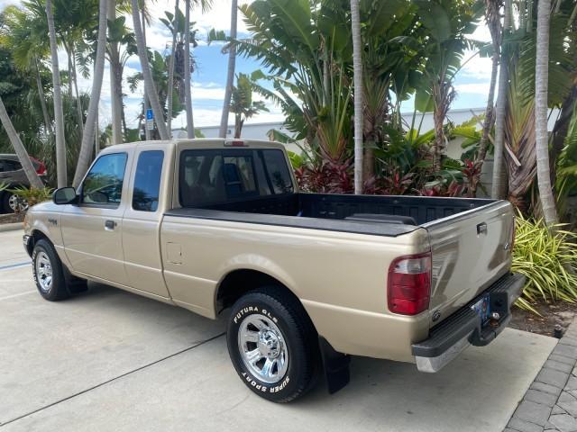 2002 Harvest Gold Metallic /Med Prairie Tan Ford Ranger XLT LOW MILES 62,461 1 OWNER (1FTYR44U32P) with an 3.0L SEFI V6 Engine engine, Automatic transmission, located at 4701 North Dixie Hwy, Pompano Beach, FL, 33064, (954) 422-2889, 26.240938, -80.123474 - OUR WEBPAGE FLORIDACARS1.COM HAS OVER 100 PHOTOS AND FREE CARFAX LINK 2002 FORD RANGER XLT APPEARANCE 1 OWNER VIN: 1FTYR44U32PA13610 1 F T Y R 4 4 U 3 2 P A 1 3 6 1 0 4 DOOR EXTENDED CAB PICKUP 3.0L V6 F OHV GASOLINE 22 MPG REAR WHEEL DRIVE Features ABS Brakes Air Conditioning AM/FM Stereo Bed Liner - Photo#33