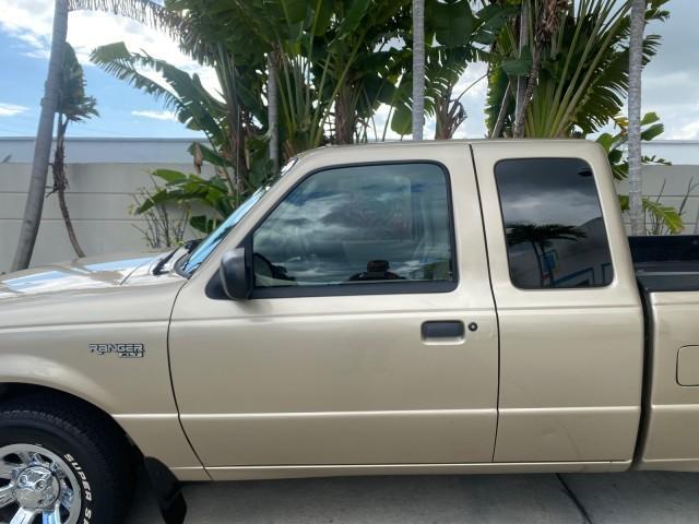2002 Harvest Gold Metallic /Med Prairie Tan Ford Ranger XLT LOW MILES 62,461 1 OWNER (1FTYR44U32P) with an 3.0L SEFI V6 Engine engine, Automatic transmission, located at 4701 North Dixie Hwy, Pompano Beach, FL, 33064, (954) 422-2889, 26.240938, -80.123474 - OUR WEBPAGE FLORIDACARS1.COM HAS OVER 100 PHOTOS AND FREE CARFAX LINK 2002 FORD RANGER XLT APPEARANCE 1 OWNER VIN: 1FTYR44U32PA13610 1 F T Y R 4 4 U 3 2 P A 1 3 6 1 0 4 DOOR EXTENDED CAB PICKUP 3.0L V6 F OHV GASOLINE 22 MPG REAR WHEEL DRIVE Features ABS Brakes Air Conditioning AM/FM Stereo Bed Liner - Photo#36