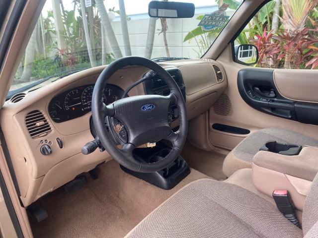 2002 Harvest Gold Metallic /Med Prairie Tan Ford Ranger XLT LOW MILES 62,461 1 OWNER (1FTYR44U32P) with an 3.0L SEFI V6 Engine engine, Automatic transmission, located at 4701 North Dixie Hwy, Pompano Beach, FL, 33064, (954) 422-2889, 26.240938, -80.123474 - OUR WEBPAGE FLORIDACARS1.COM HAS OVER 100 PHOTOS AND FREE CARFAX LINK 2002 FORD RANGER XLT APPEARANCE 1 OWNER VIN: 1FTYR44U32PA13610 1 F T Y R 4 4 U 3 2 P A 1 3 6 1 0 4 DOOR EXTENDED CAB PICKUP 3.0L V6 F OHV GASOLINE 22 MPG REAR WHEEL DRIVE Features ABS Brakes Air Conditioning AM/FM Stereo Bed Liner - Photo#46