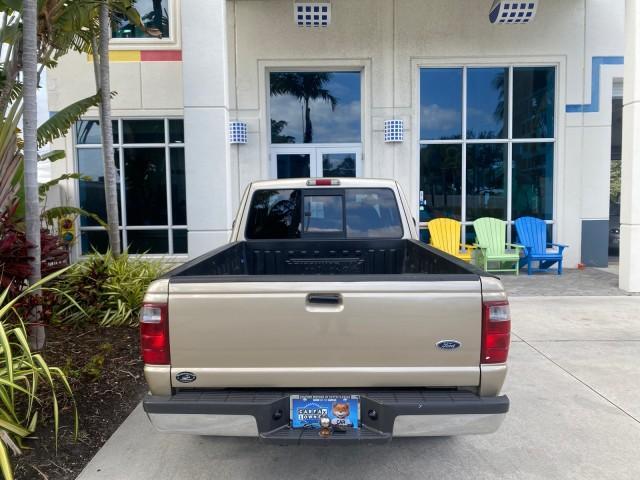 2002 Harvest Gold Metallic /Med Prairie Tan Ford Ranger XLT LOW MILES 62,461 1 OWNER (1FTYR44U32P) with an 3.0L SEFI V6 Engine engine, Automatic transmission, located at 4701 North Dixie Hwy, Pompano Beach, FL, 33064, (954) 422-2889, 26.240938, -80.123474 - OUR WEBPAGE FLORIDACARS1.COM HAS OVER 100 PHOTOS AND FREE CARFAX LINK 2002 FORD RANGER XLT APPEARANCE 1 OWNER VIN: 1FTYR44U32PA13610 1 F T Y R 4 4 U 3 2 P A 1 3 6 1 0 4 DOOR EXTENDED CAB PICKUP 3.0L V6 F OHV GASOLINE 22 MPG REAR WHEEL DRIVE Features ABS Brakes Air Conditioning AM/FM Stereo Bed Liner - Photo#86