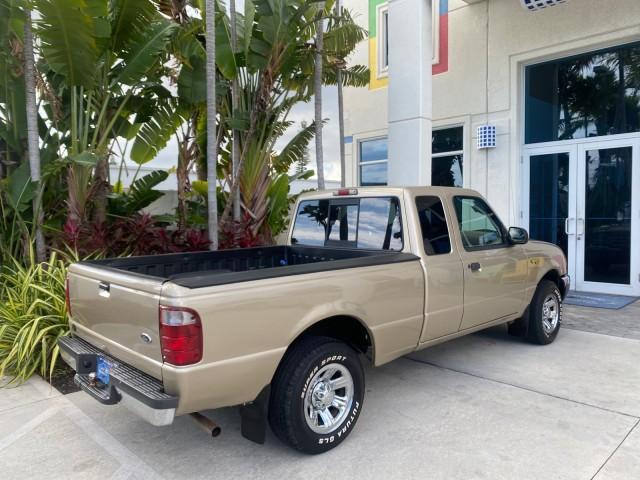 2002 Harvest Gold Metallic /Med Prairie Tan Ford Ranger XLT LOW MILES 62,461 1 OWNER (1FTYR44U32P) with an 3.0L SEFI V6 Engine engine, Automatic transmission, located at 4701 North Dixie Hwy, Pompano Beach, FL, 33064, (954) 422-2889, 26.240938, -80.123474 - OUR WEBPAGE FLORIDACARS1.COM HAS OVER 100 PHOTOS AND FREE CARFAX LINK 2002 FORD RANGER XLT APPEARANCE 1 OWNER VIN: 1FTYR44U32PA13610 1 F T Y R 4 4 U 3 2 P A 1 3 6 1 0 4 DOOR EXTENDED CAB PICKUP 3.0L V6 F OHV GASOLINE 22 MPG REAR WHEEL DRIVE Features ABS Brakes Air Conditioning AM/FM Stereo Bed Liner - Photo#88