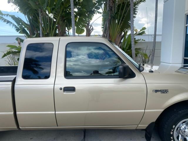 2002 Harvest Gold Metallic /Med Prairie Tan Ford Ranger XLT LOW MILES 62,461 1 OWNER (1FTYR44U32P) with an 3.0L SEFI V6 Engine engine, Automatic transmission, located at 4701 North Dixie Hwy, Pompano Beach, FL, 33064, (954) 422-2889, 26.240938, -80.123474 - OUR WEBPAGE FLORIDACARS1.COM HAS OVER 100 PHOTOS AND FREE CARFAX LINK 2002 FORD RANGER XLT APPEARANCE 1 OWNER VIN: 1FTYR44U32PA13610 1 F T Y R 4 4 U 3 2 P A 1 3 6 1 0 4 DOOR EXTENDED CAB PICKUP 3.0L V6 F OHV GASOLINE 22 MPG REAR WHEEL DRIVE Features ABS Brakes Air Conditioning AM/FM Stereo Bed Liner - Photo#98