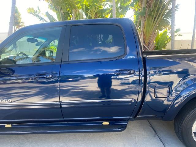 2004 Blue Marlin Pearl /Gray Toyota Tundra SR5 V8 4.7 CREW CAB FLORIDA (5TBET34174S) with an 4.7L DOHC EFI 32-Valve V8 i-Force Engine engine, Automatic transmission, located at 4701 North Dixie Hwy, Pompano Beach, FL, 33064, (954) 422-2889, 26.240938, -80.123474 - OUR WEBPAGE FLORIDACARS1.COM HAS OVER 100 PHOTOS AND FREE CARFAX LINK 2004 TOYOTA TUNDRA SR5 VIN: 5TBET34174S439824 5 T B E T 3 4 1 7 4 S 4 3 9 8 2 4 4 DOOR EXTENDED CAB PICKUP 4.7L V8 F DOHC 32V GASOLINE 19 MPG REAR WHEEL DRIVE Features ABS Brakes Air Conditioning Alloy Wheels AM/FM Stereo Automati - Photo#72
