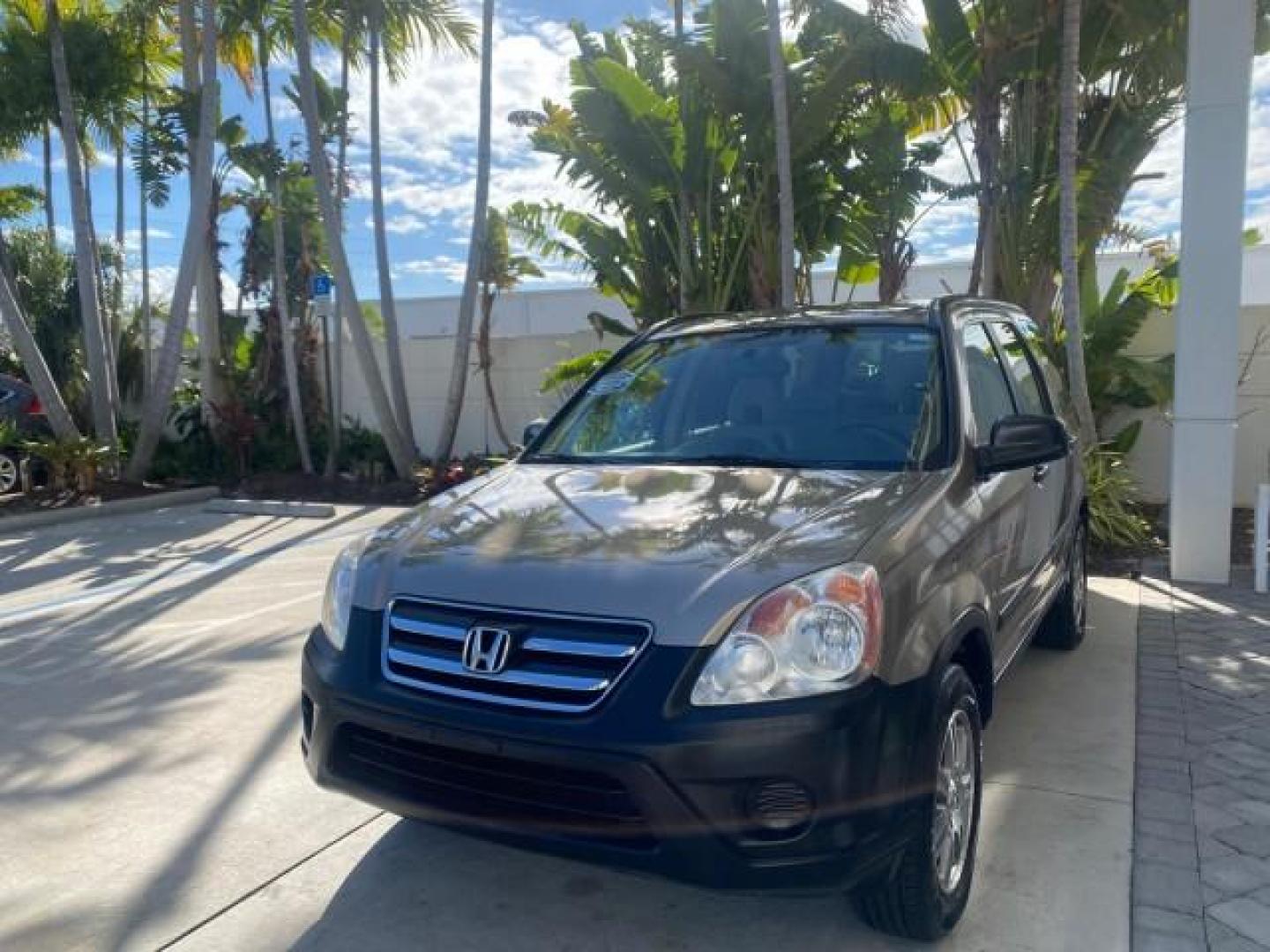 2005 Sahara Sand Metallic /Ivory Honda CR-V LX LOW MILES 52,177 SUV (SHSRD68595U) with an 2.4L DOHC MPFI 16-Valve i-VTEC I4 Engine engine, Automatic transmission, located at 4701 North Dixie Hwy, Pompano Beach, FL, 33064, (954) 422-2889, 26.240938, -80.123474 - OUR WEBPAGE FLORIDACARS1.COM HAS OVER 100 PHOTOS AND FREE CARFAX LINK 2005 HONDA CR-V LX VIN: SHSRD68595U306596 S H S R D 6 8 5 9 5 U 3 0 6 5 9 6 4 DOOR WAGON/SPORT UTILITY 2.4L I4 F DOHC GASOLINE 29 MPG FRONT WHEEL DRIVE Features ABS Brakes Air Conditioning AM/FM Stereo Automatic Transmission Casse - Photo#3