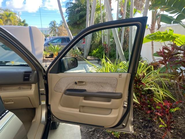 2005 Sahara Sand Metallic /Ivory Honda CR-V LX LOW MILES 52,177 SUV (SHSRD68595U) with an 2.4L DOHC MPFI 16-Valve i-VTEC I4 Engine engine, Automatic transmission, located at 4701 North Dixie Hwy, Pompano Beach, FL, 33064, (954) 422-2889, 26.240938, -80.123474 - OUR WEBPAGE FLORIDACARS1.COM HAS OVER 100 PHOTOS AND FREE CARFAX LINK 2005 HONDA CR-V LX VIN: SHSRD68595U306596 S H S R D 6 8 5 9 5 U 3 0 6 5 9 6 4 DOOR WAGON/SPORT UTILITY 2.4L I4 F DOHC GASOLINE 29 MPG FRONT WHEEL DRIVE Features ABS Brakes Air Conditioning AM/FM Stereo Automatic Transmission Casse - Photo#11