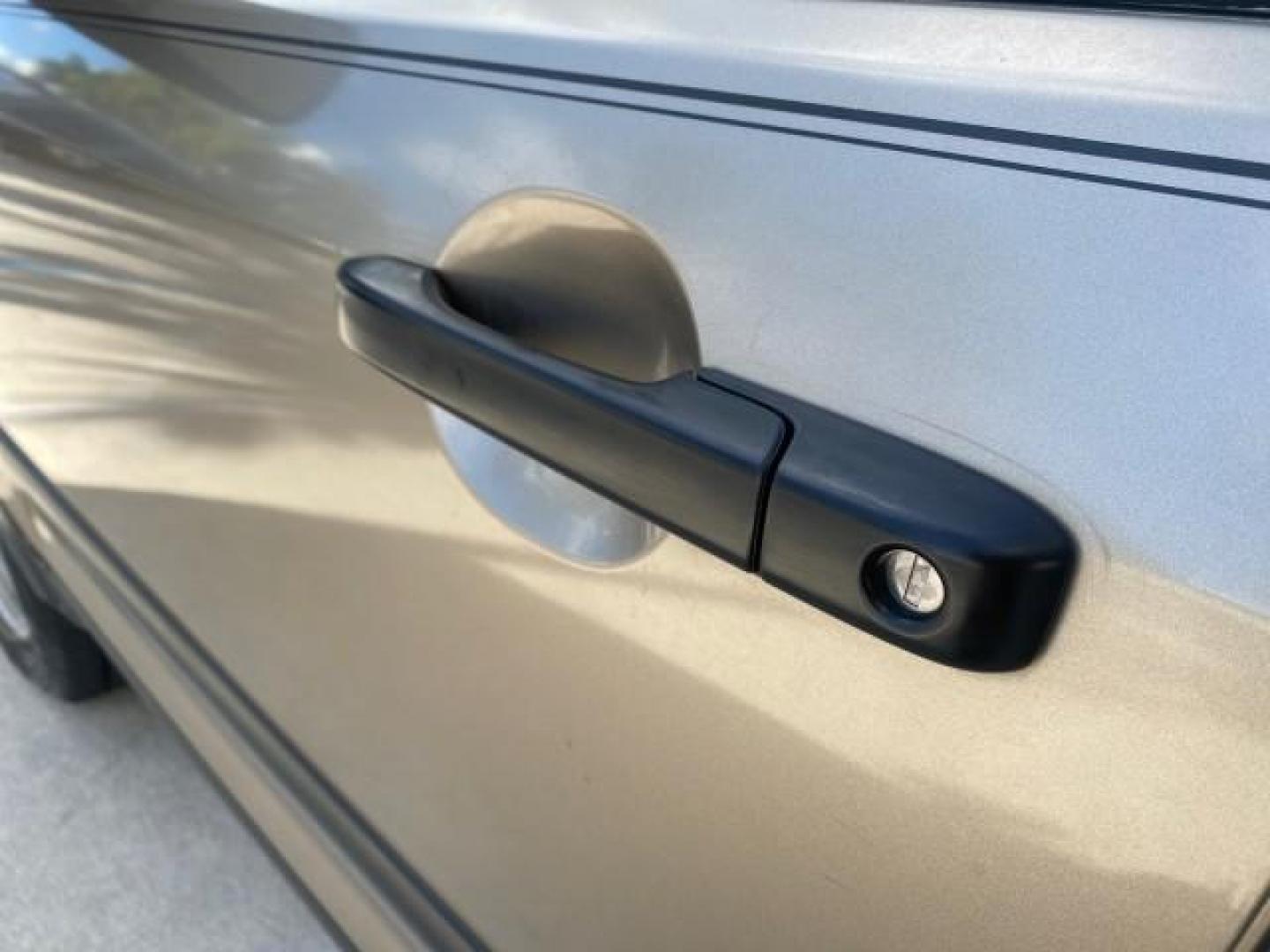 2005 Sahara Sand Metallic /Ivory Honda CR-V LX LOW MILES 52,177 SUV (SHSRD68595U) with an 2.4L DOHC MPFI 16-Valve i-VTEC I4 Engine engine, Automatic transmission, located at 4701 North Dixie Hwy, Pompano Beach, FL, 33064, (954) 422-2889, 26.240938, -80.123474 - OUR WEBPAGE FLORIDACARS1.COM HAS OVER 100 PHOTOS AND FREE CARFAX LINK 2005 HONDA CR-V LX VIN: SHSRD68595U306596 S H S R D 6 8 5 9 5 U 3 0 6 5 9 6 4 DOOR WAGON/SPORT UTILITY 2.4L I4 F DOHC GASOLINE 29 MPG FRONT WHEEL DRIVE Features ABS Brakes Air Conditioning AM/FM Stereo Automatic Transmission Casse - Photo#38