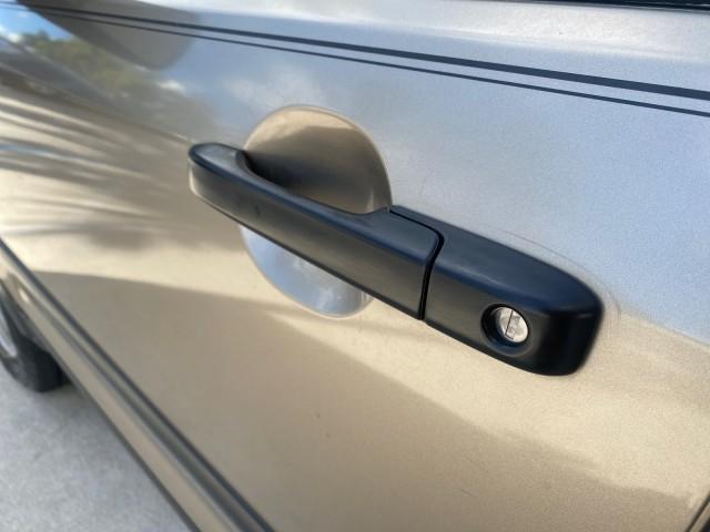 2005 Sahara Sand Metallic /Ivory Honda CR-V LX LOW MILES 52,177 SUV (SHSRD68595U) with an 2.4L DOHC MPFI 16-Valve i-VTEC I4 Engine engine, Automatic transmission, located at 4701 North Dixie Hwy, Pompano Beach, FL, 33064, (954) 422-2889, 26.240938, -80.123474 - OUR WEBPAGE FLORIDACARS1.COM HAS OVER 100 PHOTOS AND FREE CARFAX LINK 2005 HONDA CR-V LX VIN: SHSRD68595U306596 S H S R D 6 8 5 9 5 U 3 0 6 5 9 6 4 DOOR WAGON/SPORT UTILITY 2.4L I4 F DOHC GASOLINE 29 MPG FRONT WHEEL DRIVE Features ABS Brakes Air Conditioning AM/FM Stereo Automatic Transmission Casse - Photo#38