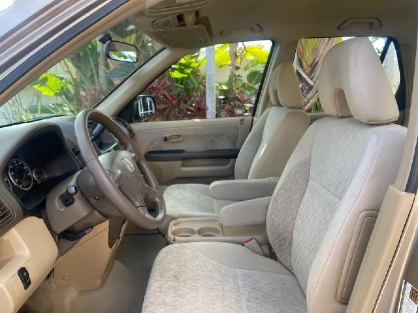 2005 Sahara Sand Metallic /Ivory Honda CR-V LX LOW MILES 52,177 SUV (SHSRD68595U) with an 2.4L DOHC MPFI 16-Valve i-VTEC I4 Engine engine, Automatic transmission, located at 4701 North Dixie Hwy, Pompano Beach, FL, 33064, (954) 422-2889, 26.240938, -80.123474 - OUR WEBPAGE FLORIDACARS1.COM HAS OVER 100 PHOTOS AND FREE CARFAX LINK 2005 HONDA CR-V LX VIN: SHSRD68595U306596 S H S R D 6 8 5 9 5 U 3 0 6 5 9 6 4 DOOR WAGON/SPORT UTILITY 2.4L I4 F DOHC GASOLINE 29 MPG FRONT WHEEL DRIVE Features ABS Brakes Air Conditioning AM/FM Stereo Automatic Transmission Casse - Photo#43