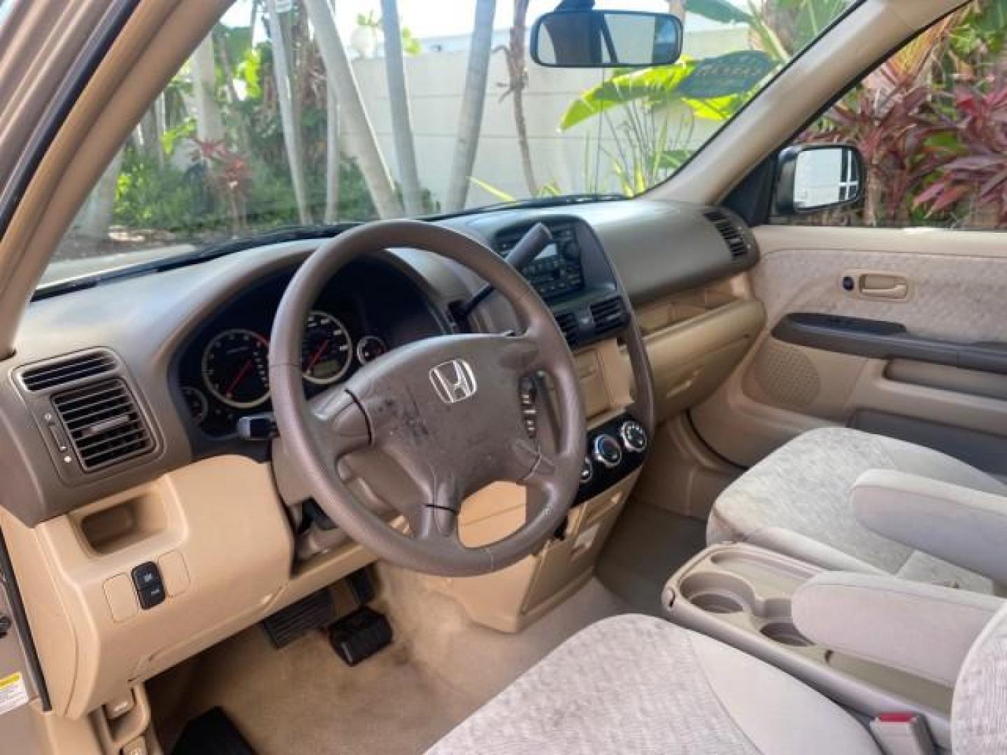 2005 Sahara Sand Metallic /Ivory Honda CR-V LX LOW MILES 52,177 SUV (SHSRD68595U) with an 2.4L DOHC MPFI 16-Valve i-VTEC I4 Engine engine, Automatic transmission, located at 4701 North Dixie Hwy, Pompano Beach, FL, 33064, (954) 422-2889, 26.240938, -80.123474 - OUR WEBPAGE FLORIDACARS1.COM HAS OVER 100 PHOTOS AND FREE CARFAX LINK 2005 HONDA CR-V LX VIN: SHSRD68595U306596 S H S R D 6 8 5 9 5 U 3 0 6 5 9 6 4 DOOR WAGON/SPORT UTILITY 2.4L I4 F DOHC GASOLINE 29 MPG FRONT WHEEL DRIVE Features ABS Brakes Air Conditioning AM/FM Stereo Automatic Transmission Casse - Photo#45
