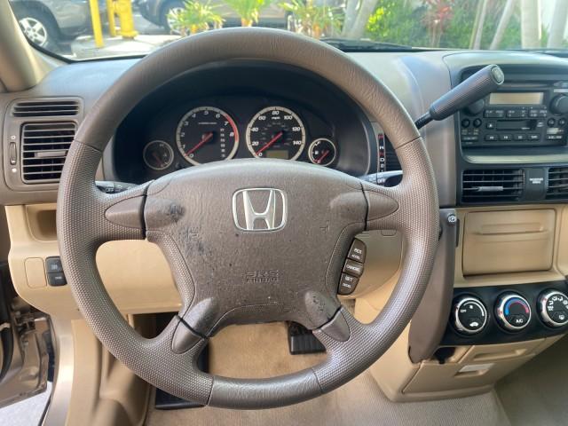 2005 Sahara Sand Metallic /Ivory Honda CR-V LX LOW MILES 52,177 SUV (SHSRD68595U) with an 2.4L DOHC MPFI 16-Valve i-VTEC I4 Engine engine, Automatic transmission, located at 4701 North Dixie Hwy, Pompano Beach, FL, 33064, (954) 422-2889, 26.240938, -80.123474 - OUR WEBPAGE FLORIDACARS1.COM HAS OVER 100 PHOTOS AND FREE CARFAX LINK 2005 HONDA CR-V LX VIN: SHSRD68595U306596 S H S R D 6 8 5 9 5 U 3 0 6 5 9 6 4 DOOR WAGON/SPORT UTILITY 2.4L I4 F DOHC GASOLINE 29 MPG FRONT WHEEL DRIVE Features ABS Brakes Air Conditioning AM/FM Stereo Automatic Transmission Casse - Photo#46