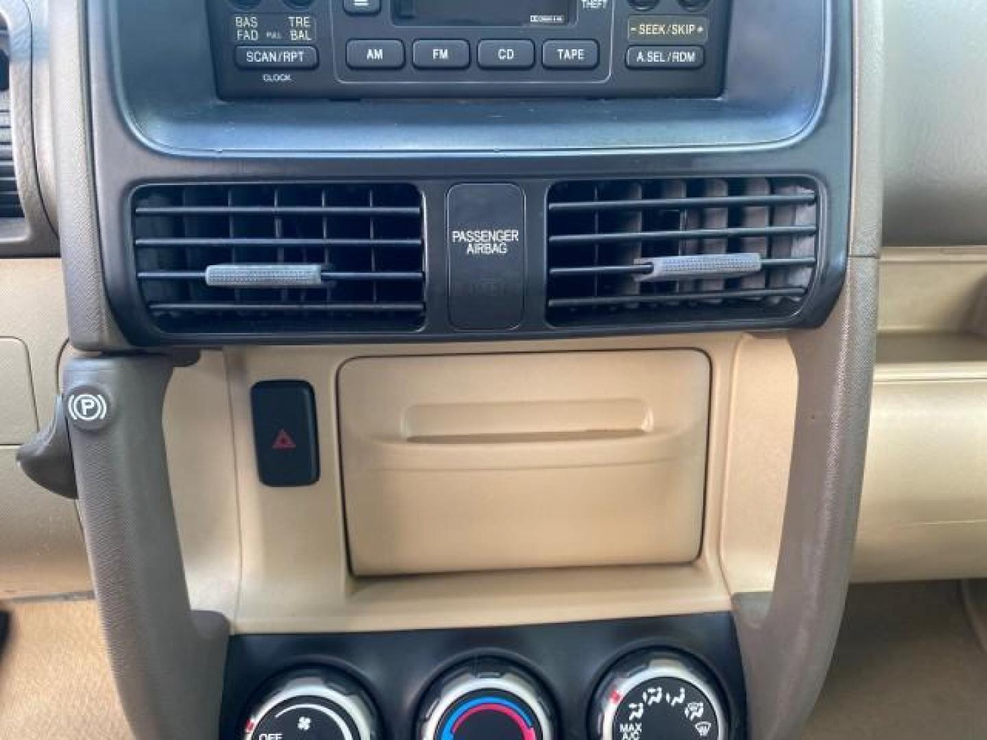 2005 Sahara Sand Metallic /Ivory Honda CR-V LX LOW MILES 52,177 SUV (SHSRD68595U) with an 2.4L DOHC MPFI 16-Valve i-VTEC I4 Engine engine, Automatic transmission, located at 4701 North Dixie Hwy, Pompano Beach, FL, 33064, (954) 422-2889, 26.240938, -80.123474 - OUR WEBPAGE FLORIDACARS1.COM HAS OVER 100 PHOTOS AND FREE CARFAX LINK 2005 HONDA CR-V LX VIN: SHSRD68595U306596 S H S R D 6 8 5 9 5 U 3 0 6 5 9 6 4 DOOR WAGON/SPORT UTILITY 2.4L I4 F DOHC GASOLINE 29 MPG FRONT WHEEL DRIVE Features ABS Brakes Air Conditioning AM/FM Stereo Automatic Transmission Casse - Photo#56