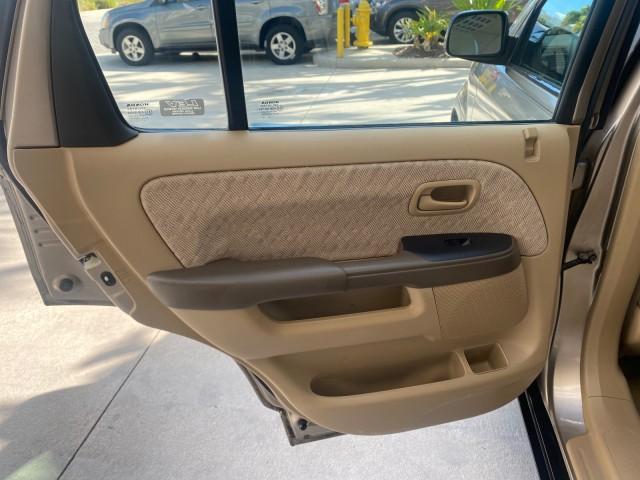 2005 Sahara Sand Metallic /Ivory Honda CR-V LX LOW MILES 52,177 SUV (SHSRD68595U) with an 2.4L DOHC MPFI 16-Valve i-VTEC I4 Engine engine, Automatic transmission, located at 4701 North Dixie Hwy, Pompano Beach, FL, 33064, (954) 422-2889, 26.240938, -80.123474 - OUR WEBPAGE FLORIDACARS1.COM HAS OVER 100 PHOTOS AND FREE CARFAX LINK 2005 HONDA CR-V LX VIN: SHSRD68595U306596 S H S R D 6 8 5 9 5 U 3 0 6 5 9 6 4 DOOR WAGON/SPORT UTILITY 2.4L I4 F DOHC GASOLINE 29 MPG FRONT WHEEL DRIVE Features ABS Brakes Air Conditioning AM/FM Stereo Automatic Transmission Casse - Photo#71