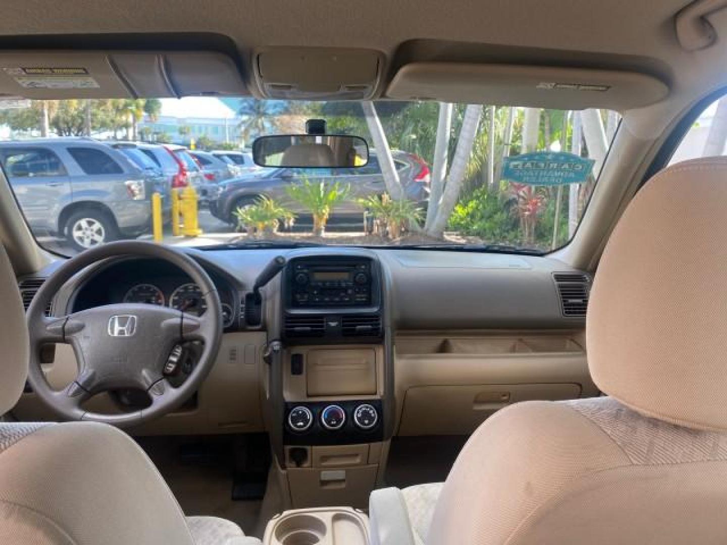 2005 Sahara Sand Metallic /Ivory Honda CR-V LX LOW MILES 52,177 SUV (SHSRD68595U) with an 2.4L DOHC MPFI 16-Valve i-VTEC I4 Engine engine, Automatic transmission, located at 4701 North Dixie Hwy, Pompano Beach, FL, 33064, (954) 422-2889, 26.240938, -80.123474 - OUR WEBPAGE FLORIDACARS1.COM HAS OVER 100 PHOTOS AND FREE CARFAX LINK 2005 HONDA CR-V LX VIN: SHSRD68595U306596 S H S R D 6 8 5 9 5 U 3 0 6 5 9 6 4 DOOR WAGON/SPORT UTILITY 2.4L I4 F DOHC GASOLINE 29 MPG FRONT WHEEL DRIVE Features ABS Brakes Air Conditioning AM/FM Stereo Automatic Transmission Casse - Photo#77