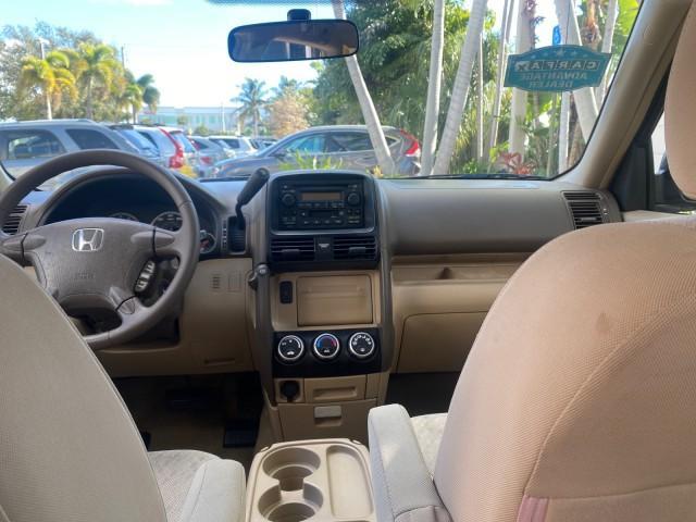 2005 Sahara Sand Metallic /Ivory Honda CR-V LX LOW MILES 52,177 SUV (SHSRD68595U) with an 2.4L DOHC MPFI 16-Valve i-VTEC I4 Engine engine, Automatic transmission, located at 4701 North Dixie Hwy, Pompano Beach, FL, 33064, (954) 422-2889, 26.240938, -80.123474 - OUR WEBPAGE FLORIDACARS1.COM HAS OVER 100 PHOTOS AND FREE CARFAX LINK 2005 HONDA CR-V LX VIN: SHSRD68595U306596 S H S R D 6 8 5 9 5 U 3 0 6 5 9 6 4 DOOR WAGON/SPORT UTILITY 2.4L I4 F DOHC GASOLINE 29 MPG FRONT WHEEL DRIVE Features ABS Brakes Air Conditioning AM/FM Stereo Automatic Transmission Casse - Photo#78