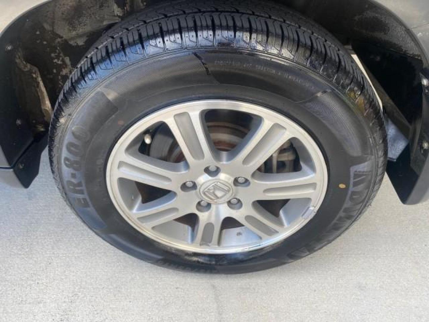 2005 Sahara Sand Metallic /Ivory Honda CR-V LX LOW MILES 52,177 SUV (SHSRD68595U) with an 2.4L DOHC MPFI 16-Valve i-VTEC I4 Engine engine, Automatic transmission, located at 4701 North Dixie Hwy, Pompano Beach, FL, 33064, (954) 422-2889, 26.240938, -80.123474 - OUR WEBPAGE FLORIDACARS1.COM HAS OVER 100 PHOTOS AND FREE CARFAX LINK 2005 HONDA CR-V LX VIN: SHSRD68595U306596 S H S R D 6 8 5 9 5 U 3 0 6 5 9 6 4 DOOR WAGON/SPORT UTILITY 2.4L I4 F DOHC GASOLINE 29 MPG FRONT WHEEL DRIVE Features ABS Brakes Air Conditioning AM/FM Stereo Automatic Transmission Casse - Photo#80