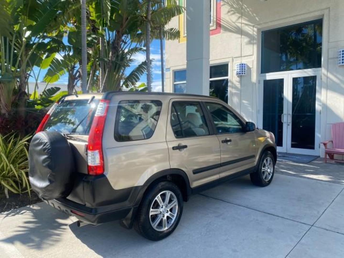 2005 Sahara Sand Metallic /Ivory Honda CR-V LX LOW MILES 52,177 SUV (SHSRD68595U) with an 2.4L DOHC MPFI 16-Valve i-VTEC I4 Engine engine, Automatic transmission, located at 4701 North Dixie Hwy, Pompano Beach, FL, 33064, (954) 422-2889, 26.240938, -80.123474 - OUR WEBPAGE FLORIDACARS1.COM HAS OVER 100 PHOTOS AND FREE CARFAX LINK 2005 HONDA CR-V LX VIN: SHSRD68595U306596 S H S R D 6 8 5 9 5 U 3 0 6 5 9 6 4 DOOR WAGON/SPORT UTILITY 2.4L I4 F DOHC GASOLINE 29 MPG FRONT WHEEL DRIVE Features ABS Brakes Air Conditioning AM/FM Stereo Automatic Transmission Casse - Photo#97