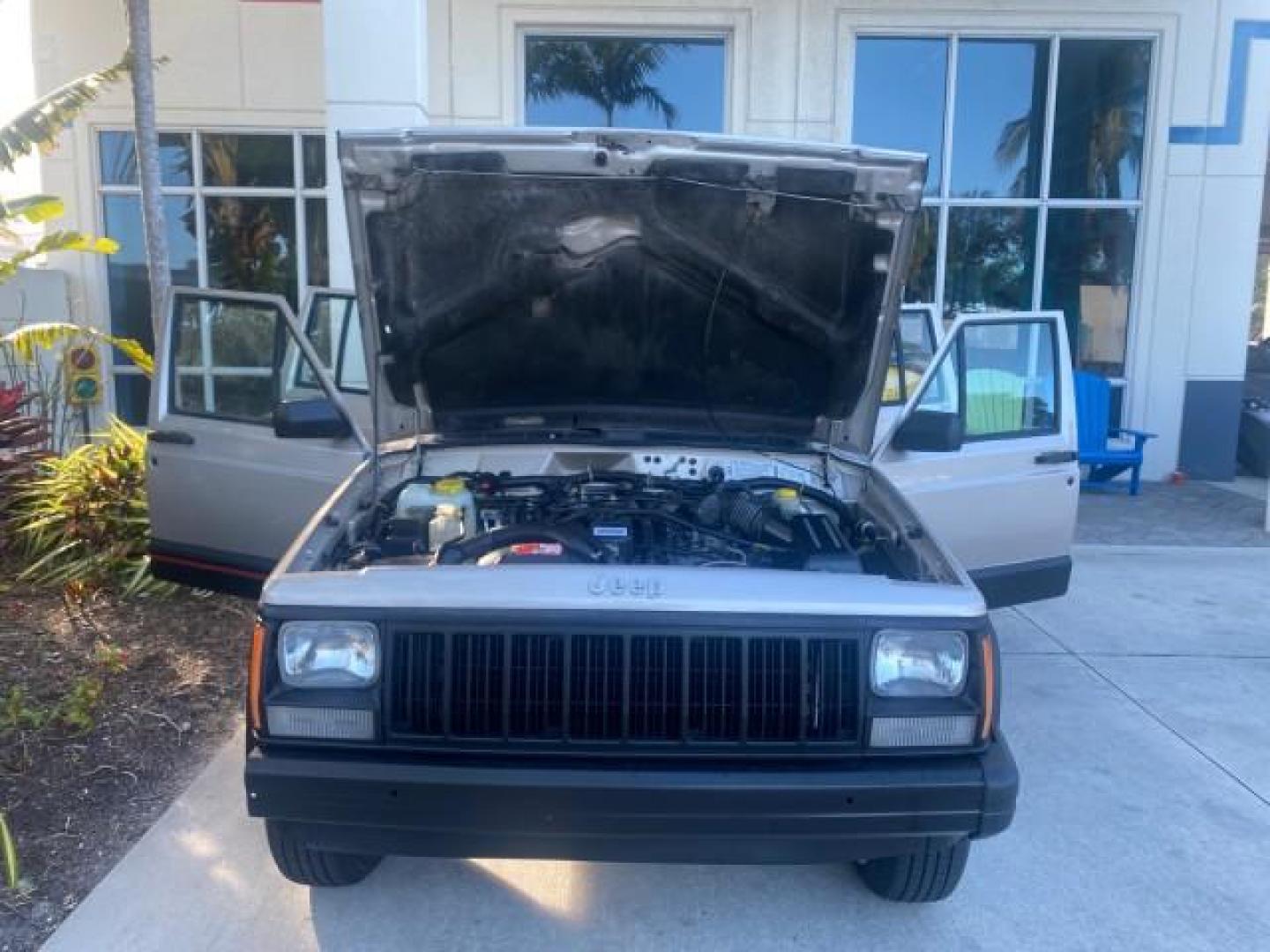 1996 Stone White (CC) /Dark Sand Jeep Cherokee Sport FL LOW MILES 77,388 4WD 4.0 6 CYL (1J4FJ68S2TL) with an 4.0L MPI I6 Engine engine, Automatic transmission, located at 4701 North Dixie Hwy, Pompano Beach, FL, 33064, (954) 422-2889, 26.240938, -80.123474 - OUR WEBPAGE FLORIDACARS1.COM HAS OVER 100 PHOTOS AND FREE CARFAX LINK 1996 JEEP CHEROKEE SPORT 4.0 6 CYL 4WD FL TITLE LOW MILES 77,388 VIN: 1J4FJ68S2TL171877 1 J 4 F J 6 8 S 2 T L 1 7 1 8 7 7 4 DOOR WAGON/SPORT UTILITY 4.0L I6 F GASOLINE REAR WHEEL DRIVE W/ 4X4 Top Features Cloth Seats Basic Feature- Photo#17