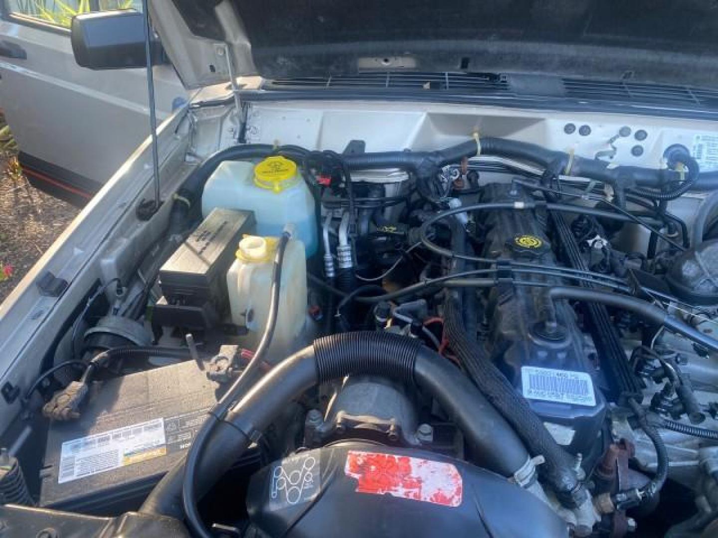 1996 Stone White (CC) /Dark Sand Jeep Cherokee Sport FL LOW MILES 77,388 4WD 4.0 6 CYL (1J4FJ68S2TL) with an 4.0L MPI I6 Engine engine, Automatic transmission, located at 4701 North Dixie Hwy, Pompano Beach, FL, 33064, (954) 422-2889, 26.240938, -80.123474 - OUR WEBPAGE FLORIDACARS1.COM HAS OVER 100 PHOTOS AND FREE CARFAX LINK 1996 JEEP CHEROKEE SPORT 4.0 6 CYL 4WD FL TITLE LOW MILES 77,388 VIN: 1J4FJ68S2TL171877 1 J 4 F J 6 8 S 2 T L 1 7 1 8 7 7 4 DOOR WAGON/SPORT UTILITY 4.0L I6 F GASOLINE REAR WHEEL DRIVE W/ 4X4 Top Features Cloth Seats Basic Feature- Photo#24