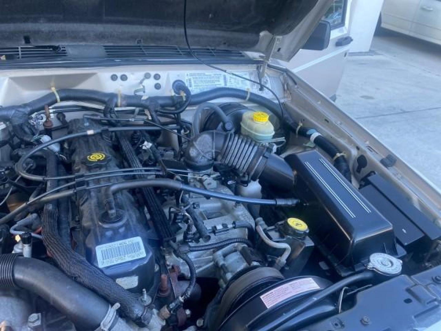 1996 Stone White (CC) /Dark Sand Jeep Cherokee Sport FL LOW MILES 77,388 4WD 4.0 6 CYL (1J4FJ68S2TL) with an 4.0L MPI I6 Engine engine, Automatic transmission, located at 4701 North Dixie Hwy, Pompano Beach, FL, 33064, (954) 422-2889, 26.240938, -80.123474 - OUR WEBPAGE FLORIDACARS1.COM HAS OVER 100 PHOTOS AND FREE CARFAX LINK 1996 JEEP CHEROKEE SPORT 4.0 6 CYL 4WD FL TITLE LOW MILES 77,388 VIN: 1J4FJ68S2TL171877 1 J 4 F J 6 8 S 2 T L 1 7 1 8 7 7 4 DOOR WAGON/SPORT UTILITY 4.0L I6 F GASOLINE REAR WHEEL DRIVE W/ 4X4 Top Features Cloth Seats Basic Feature- Photo#25