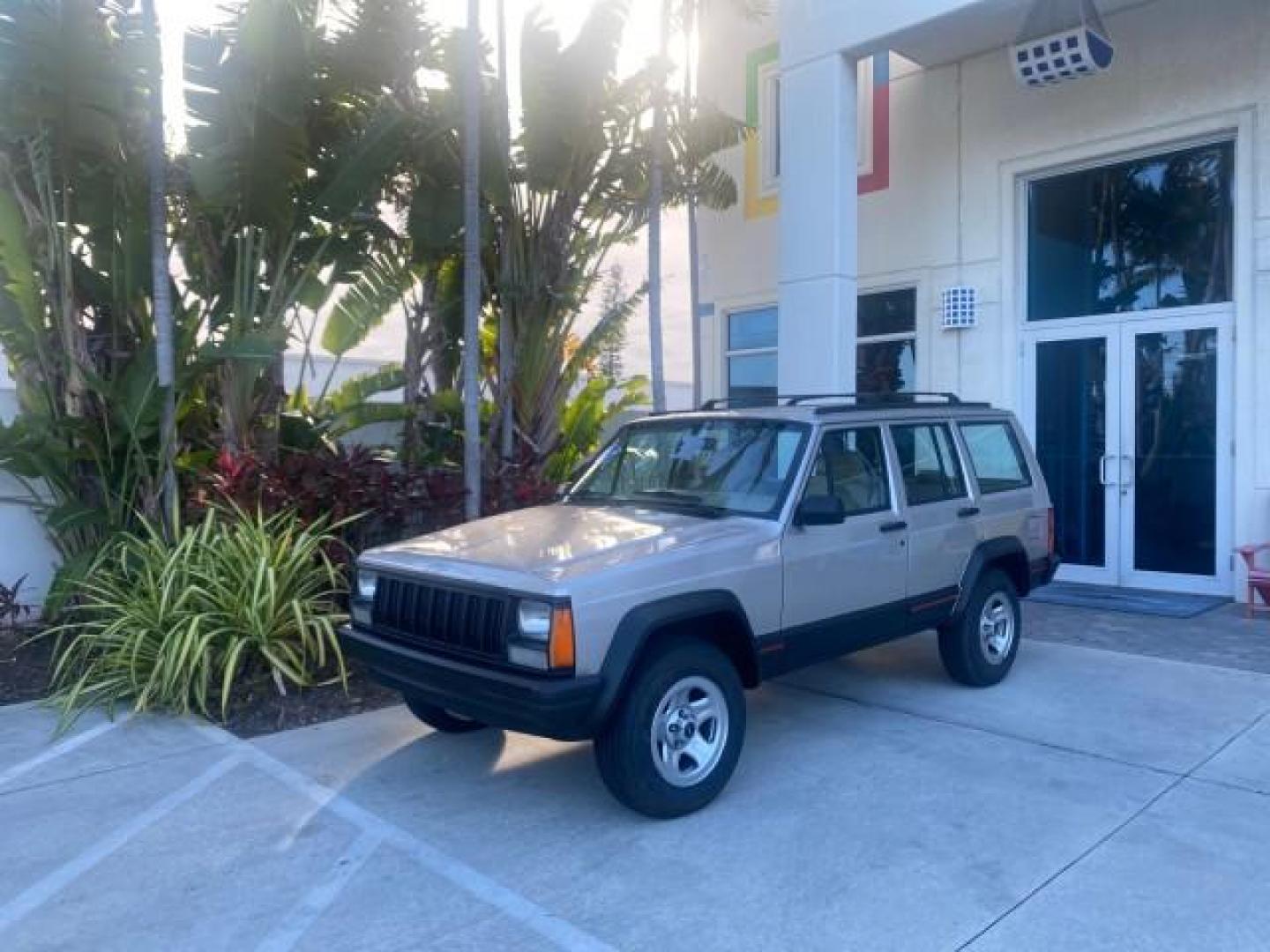 1996 Stone White (CC) /Dark Sand Jeep Cherokee Sport FL LOW MILES 77,388 4WD 4.0 6 CYL (1J4FJ68S2TL) with an 4.0L MPI I6 Engine engine, Automatic transmission, located at 4701 North Dixie Hwy, Pompano Beach, FL, 33064, (954) 422-2889, 26.240938, -80.123474 - OUR WEBPAGE FLORIDACARS1.COM HAS OVER 100 PHOTOS AND FREE CARFAX LINK 1996 JEEP CHEROKEE SPORT 4.0 6 CYL 4WD FL TITLE LOW MILES 77,388 VIN: 1J4FJ68S2TL171877 1 J 4 F J 6 8 S 2 T L 1 7 1 8 7 7 4 DOOR WAGON/SPORT UTILITY 4.0L I6 F GASOLINE REAR WHEEL DRIVE W/ 4X4 Top Features Cloth Seats Basic Feature- Photo#28
