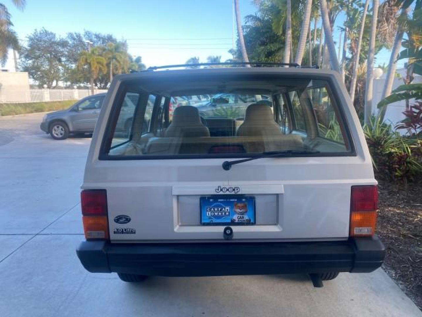 1996 Stone White (CC) /Dark Sand Jeep Cherokee Sport FL LOW MILES 77,388 4WD 4.0 6 CYL (1J4FJ68S2TL) with an 4.0L MPI I6 Engine engine, Automatic transmission, located at 4701 North Dixie Hwy, Pompano Beach, FL, 33064, (954) 422-2889, 26.240938, -80.123474 - OUR WEBPAGE FLORIDACARS1.COM HAS OVER 100 PHOTOS AND FREE CARFAX LINK 1996 JEEP CHEROKEE SPORT 4.0 6 CYL 4WD FL TITLE LOW MILES 77,388 VIN: 1J4FJ68S2TL171877 1 J 4 F J 6 8 S 2 T L 1 7 1 8 7 7 4 DOOR WAGON/SPORT UTILITY 4.0L I6 F GASOLINE REAR WHEEL DRIVE W/ 4X4 Top Features Cloth Seats Basic Feature- Photo#35