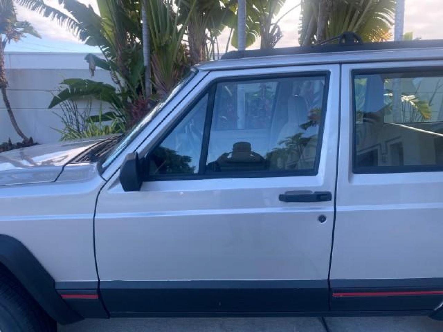 1996 Stone White (CC) /Dark Sand Jeep Cherokee Sport FL LOW MILES 77,388 4WD 4.0 6 CYL (1J4FJ68S2TL) with an 4.0L MPI I6 Engine engine, Automatic transmission, located at 4701 North Dixie Hwy, Pompano Beach, FL, 33064, (954) 422-2889, 26.240938, -80.123474 - OUR WEBPAGE FLORIDACARS1.COM HAS OVER 100 PHOTOS AND FREE CARFAX LINK 1996 JEEP CHEROKEE SPORT 4.0 6 CYL 4WD FL TITLE LOW MILES 77,388 VIN: 1J4FJ68S2TL171877 1 J 4 F J 6 8 S 2 T L 1 7 1 8 7 7 4 DOOR WAGON/SPORT UTILITY 4.0L I6 F GASOLINE REAR WHEEL DRIVE W/ 4X4 Top Features Cloth Seats Basic Feature- Photo#36
