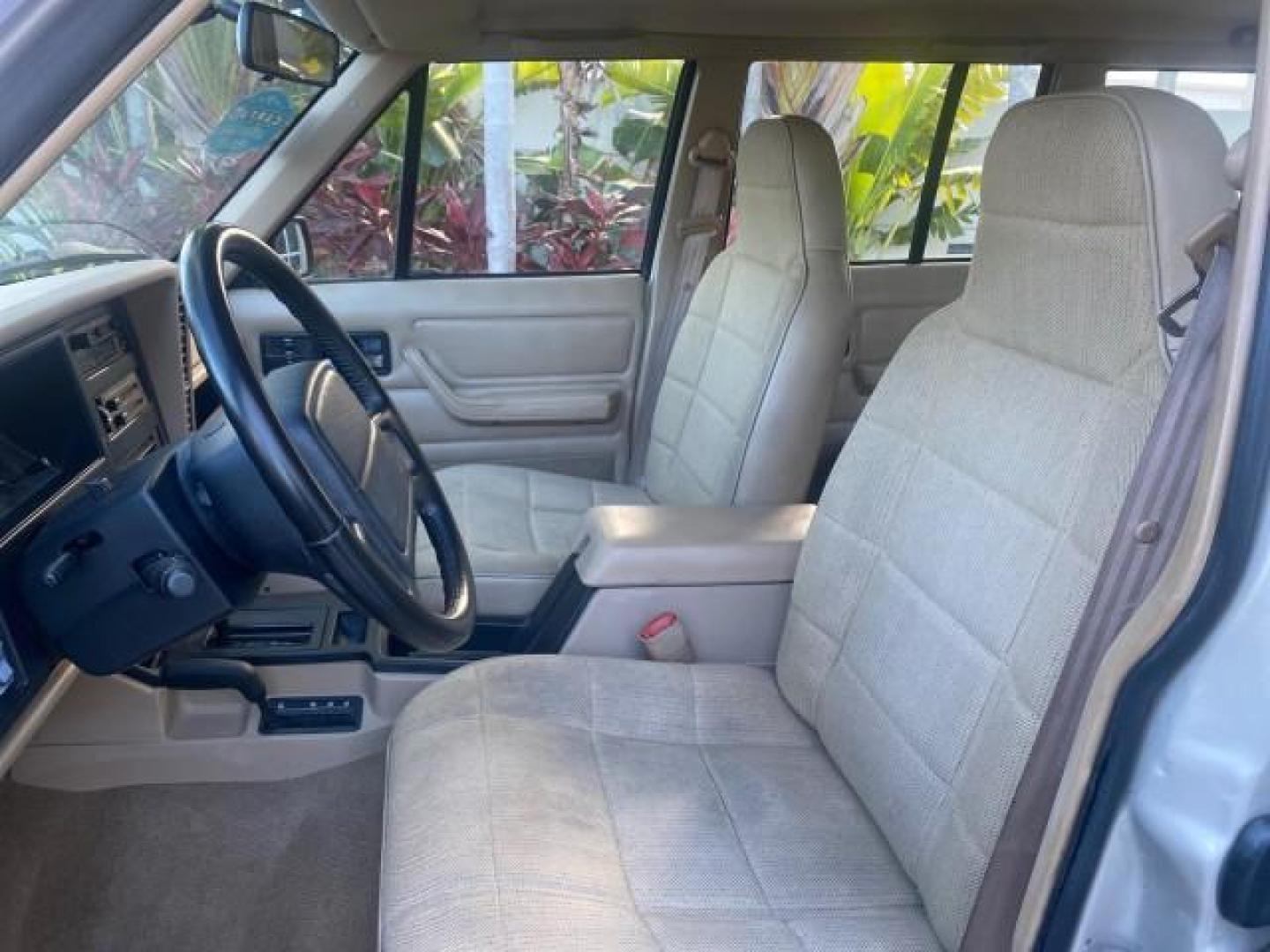 1996 Stone White (CC) /Dark Sand Jeep Cherokee Sport FL LOW MILES 77,388 4WD 4.0 6 CYL (1J4FJ68S2TL) with an 4.0L MPI I6 Engine engine, Automatic transmission, located at 4701 North Dixie Hwy, Pompano Beach, FL, 33064, (954) 422-2889, 26.240938, -80.123474 - OUR WEBPAGE FLORIDACARS1.COM HAS OVER 100 PHOTOS AND FREE CARFAX LINK 1996 JEEP CHEROKEE SPORT 4.0 6 CYL 4WD FL TITLE LOW MILES 77,388 VIN: 1J4FJ68S2TL171877 1 J 4 F J 6 8 S 2 T L 1 7 1 8 7 7 4 DOOR WAGON/SPORT UTILITY 4.0L I6 F GASOLINE REAR WHEEL DRIVE W/ 4X4 Top Features Cloth Seats Basic Feature- Photo#41