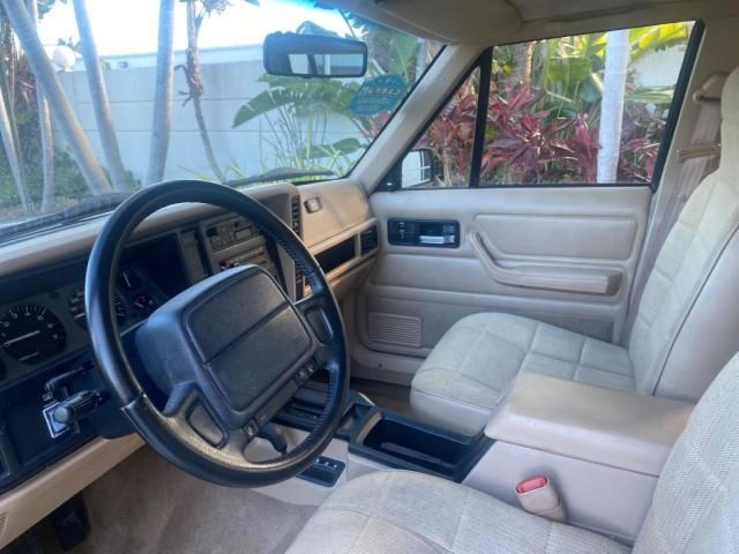 1996 Stone White (CC) /Dark Sand Jeep Cherokee Sport FL LOW MILES 77,388 4WD 4.0 6 CYL (1J4FJ68S2TL) with an 4.0L MPI I6 Engine engine, Automatic transmission, located at 4701 North Dixie Hwy, Pompano Beach, FL, 33064, (954) 422-2889, 26.240938, -80.123474 - OUR WEBPAGE FLORIDACARS1.COM HAS OVER 100 PHOTOS AND FREE CARFAX LINK 1996 JEEP CHEROKEE SPORT 4.0 6 CYL 4WD FL TITLE LOW MILES 77,388 VIN: 1J4FJ68S2TL171877 1 J 4 F J 6 8 S 2 T L 1 7 1 8 7 7 4 DOOR WAGON/SPORT UTILITY 4.0L I6 F GASOLINE REAR WHEEL DRIVE W/ 4X4 Top Features Cloth Seats Basic Feature- Photo#43