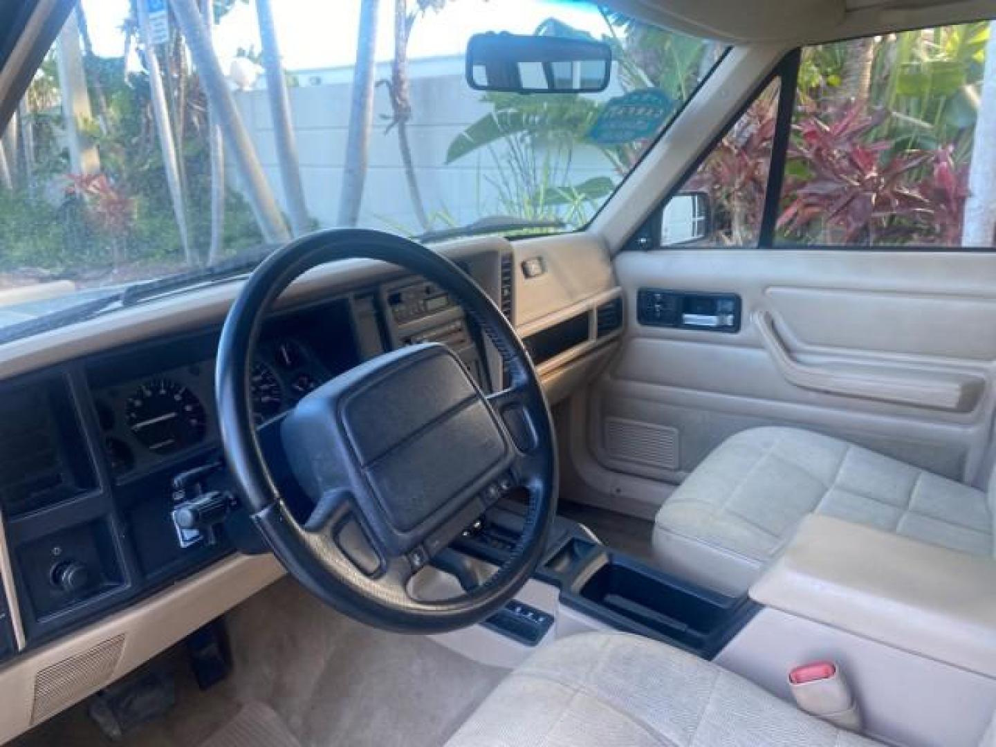 1996 Stone White (CC) /Dark Sand Jeep Cherokee Sport FL LOW MILES 77,388 4WD 4.0 6 CYL (1J4FJ68S2TL) with an 4.0L MPI I6 Engine engine, Automatic transmission, located at 4701 North Dixie Hwy, Pompano Beach, FL, 33064, (954) 422-2889, 26.240938, -80.123474 - OUR WEBPAGE FLORIDACARS1.COM HAS OVER 100 PHOTOS AND FREE CARFAX LINK 1996 JEEP CHEROKEE SPORT 4.0 6 CYL 4WD FL TITLE LOW MILES 77,388 VIN: 1J4FJ68S2TL171877 1 J 4 F J 6 8 S 2 T L 1 7 1 8 7 7 4 DOOR WAGON/SPORT UTILITY 4.0L I6 F GASOLINE REAR WHEEL DRIVE W/ 4X4 Top Features Cloth Seats Basic Feature- Photo#44