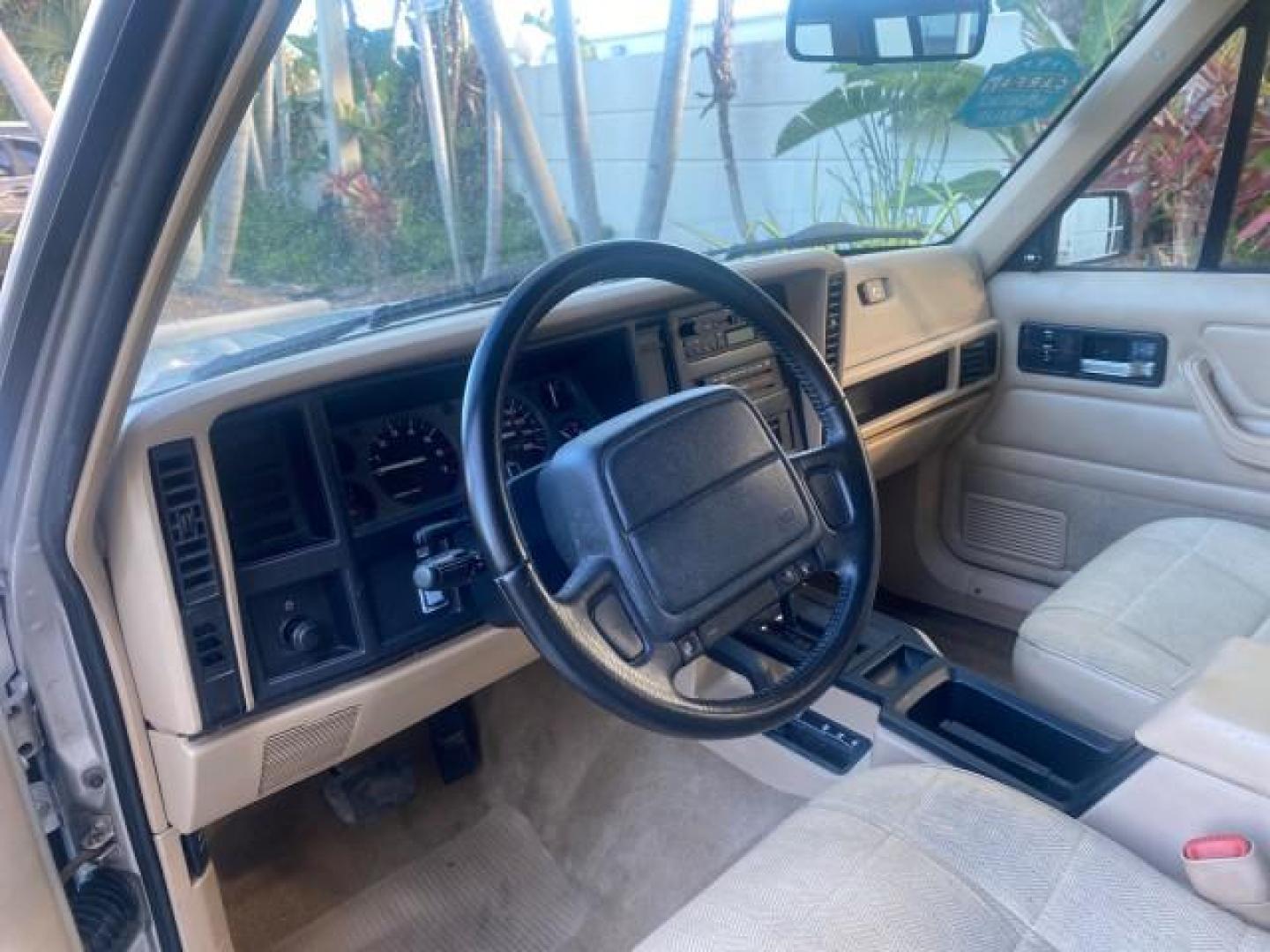 1996 Stone White (CC) /Dark Sand Jeep Cherokee Sport FL LOW MILES 77,388 4WD 4.0 6 CYL (1J4FJ68S2TL) with an 4.0L MPI I6 Engine engine, Automatic transmission, located at 4701 North Dixie Hwy, Pompano Beach, FL, 33064, (954) 422-2889, 26.240938, -80.123474 - OUR WEBPAGE FLORIDACARS1.COM HAS OVER 100 PHOTOS AND FREE CARFAX LINK 1996 JEEP CHEROKEE SPORT 4.0 6 CYL 4WD FL TITLE LOW MILES 77,388 VIN: 1J4FJ68S2TL171877 1 J 4 F J 6 8 S 2 T L 1 7 1 8 7 7 4 DOOR WAGON/SPORT UTILITY 4.0L I6 F GASOLINE REAR WHEEL DRIVE W/ 4X4 Top Features Cloth Seats Basic Feature- Photo#45