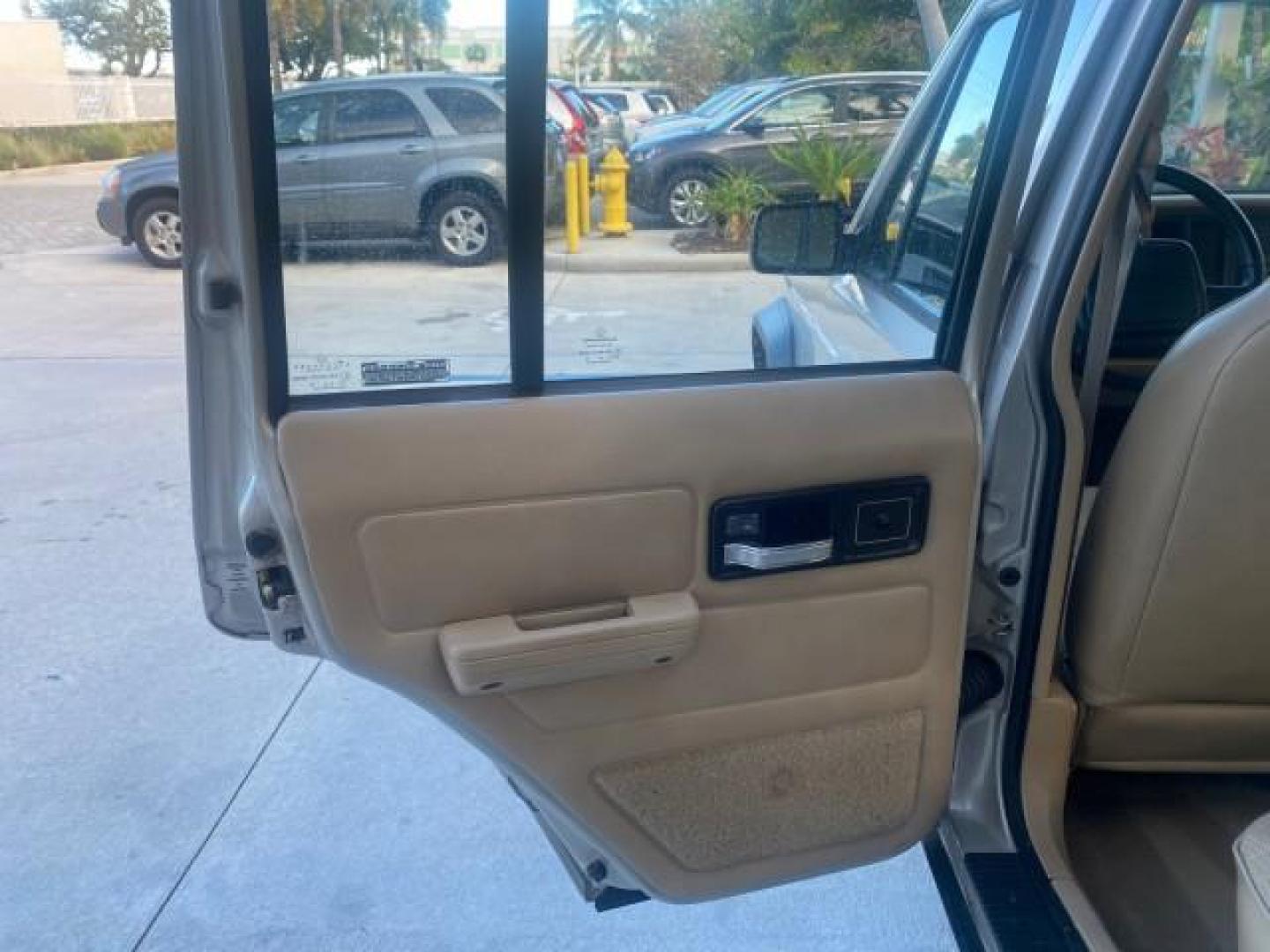 1996 Stone White (CC) /Dark Sand Jeep Cherokee Sport FL LOW MILES 77,388 4WD 4.0 6 CYL (1J4FJ68S2TL) with an 4.0L MPI I6 Engine engine, Automatic transmission, located at 4701 North Dixie Hwy, Pompano Beach, FL, 33064, (954) 422-2889, 26.240938, -80.123474 - OUR WEBPAGE FLORIDACARS1.COM HAS OVER 100 PHOTOS AND FREE CARFAX LINK 1996 JEEP CHEROKEE SPORT 4.0 6 CYL 4WD FL TITLE LOW MILES 77,388 VIN: 1J4FJ68S2TL171877 1 J 4 F J 6 8 S 2 T L 1 7 1 8 7 7 4 DOOR WAGON/SPORT UTILITY 4.0L I6 F GASOLINE REAR WHEEL DRIVE W/ 4X4 Top Features Cloth Seats Basic Feature- Photo#70
