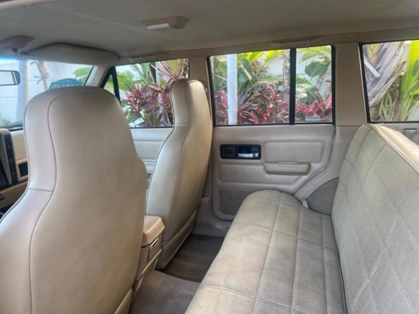 1996 Stone White (CC) /Dark Sand Jeep Cherokee Sport FL LOW MILES 77,388 4WD 4.0 6 CYL (1J4FJ68S2TL) with an 4.0L MPI I6 Engine engine, Automatic transmission, located at 4701 North Dixie Hwy, Pompano Beach, FL, 33064, (954) 422-2889, 26.240938, -80.123474 - OUR WEBPAGE FLORIDACARS1.COM HAS OVER 100 PHOTOS AND FREE CARFAX LINK 1996 JEEP CHEROKEE SPORT 4.0 6 CYL 4WD FL TITLE LOW MILES 77,388 VIN: 1J4FJ68S2TL171877 1 J 4 F J 6 8 S 2 T L 1 7 1 8 7 7 4 DOOR WAGON/SPORT UTILITY 4.0L I6 F GASOLINE REAR WHEEL DRIVE W/ 4X4 Top Features Cloth Seats Basic Feature- Photo#73