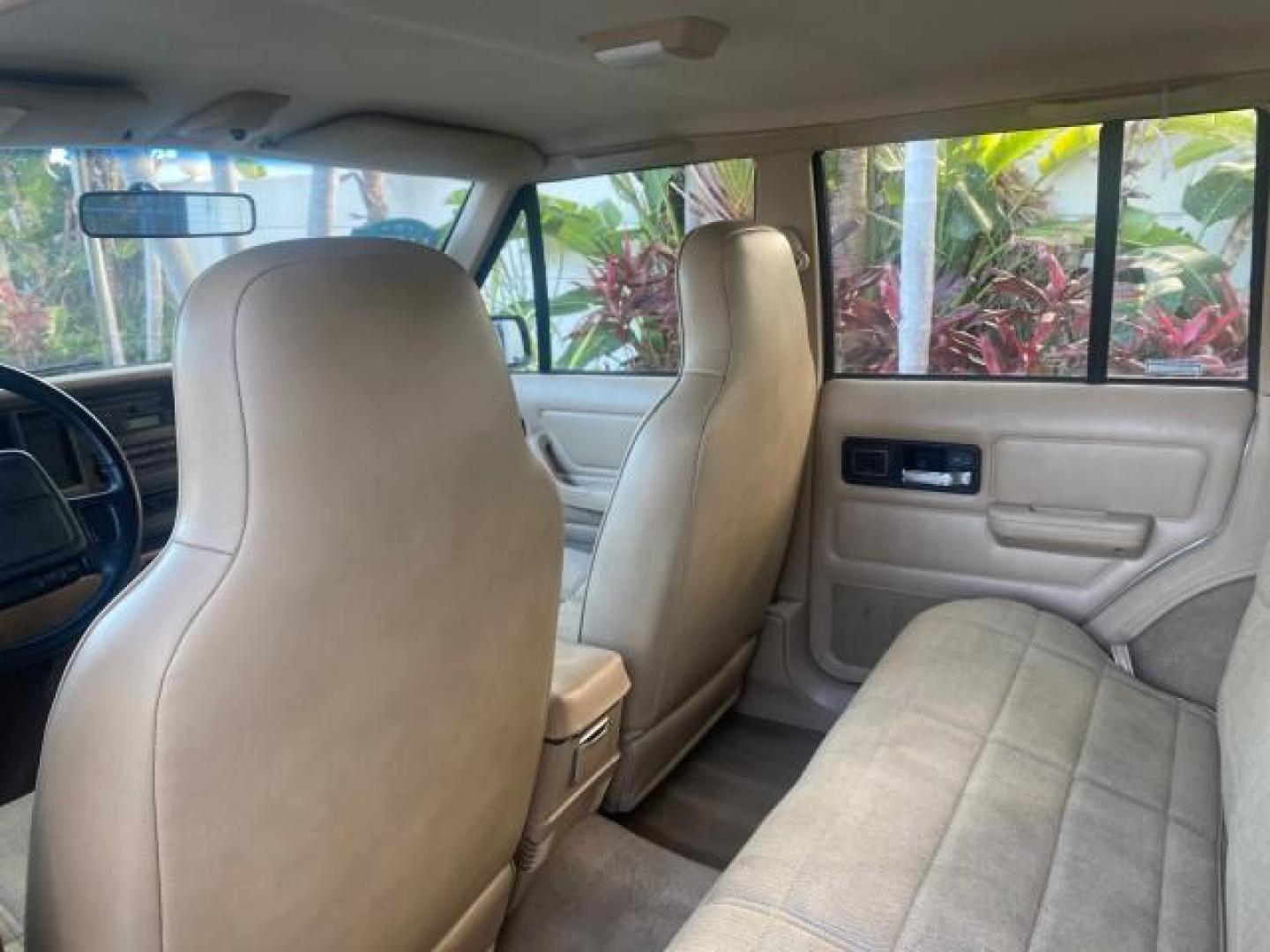1996 Stone White (CC) /Dark Sand Jeep Cherokee Sport FL LOW MILES 77,388 4WD 4.0 6 CYL (1J4FJ68S2TL) with an 4.0L MPI I6 Engine engine, Automatic transmission, located at 4701 North Dixie Hwy, Pompano Beach, FL, 33064, (954) 422-2889, 26.240938, -80.123474 - OUR WEBPAGE FLORIDACARS1.COM HAS OVER 100 PHOTOS AND FREE CARFAX LINK 1996 JEEP CHEROKEE SPORT 4.0 6 CYL 4WD FL TITLE LOW MILES 77,388 VIN: 1J4FJ68S2TL171877 1 J 4 F J 6 8 S 2 T L 1 7 1 8 7 7 4 DOOR WAGON/SPORT UTILITY 4.0L I6 F GASOLINE REAR WHEEL DRIVE W/ 4X4 Top Features Cloth Seats Basic Feature- Photo#74