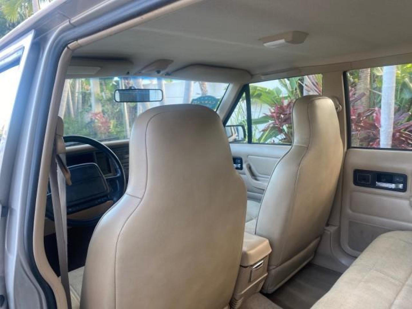 1996 Stone White (CC) /Dark Sand Jeep Cherokee Sport FL LOW MILES 77,388 4WD 4.0 6 CYL (1J4FJ68S2TL) with an 4.0L MPI I6 Engine engine, Automatic transmission, located at 4701 North Dixie Hwy, Pompano Beach, FL, 33064, (954) 422-2889, 26.240938, -80.123474 - OUR WEBPAGE FLORIDACARS1.COM HAS OVER 100 PHOTOS AND FREE CARFAX LINK 1996 JEEP CHEROKEE SPORT 4.0 6 CYL 4WD FL TITLE LOW MILES 77,388 VIN: 1J4FJ68S2TL171877 1 J 4 F J 6 8 S 2 T L 1 7 1 8 7 7 4 DOOR WAGON/SPORT UTILITY 4.0L I6 F GASOLINE REAR WHEEL DRIVE W/ 4X4 Top Features Cloth Seats Basic Feature- Photo#76