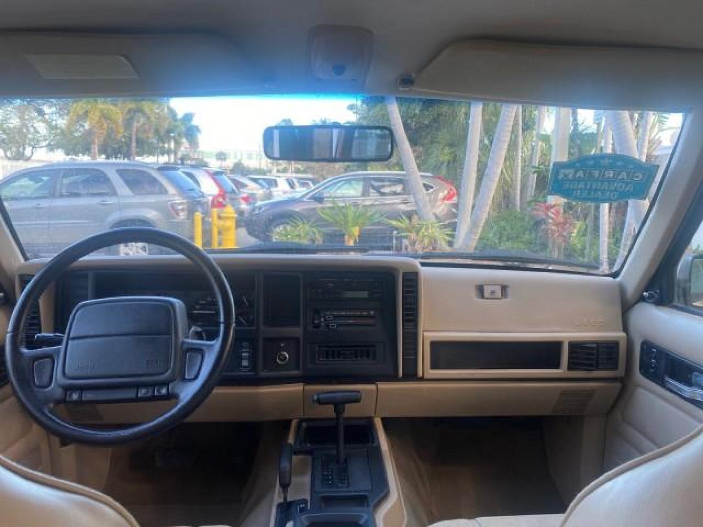1996 Stone White (CC) /Dark Sand Jeep Cherokee Sport FL LOW MILES 77,388 4WD 4.0 6 CYL (1J4FJ68S2TL) with an 4.0L MPI I6 Engine engine, Automatic transmission, located at 4701 North Dixie Hwy, Pompano Beach, FL, 33064, (954) 422-2889, 26.240938, -80.123474 - OUR WEBPAGE FLORIDACARS1.COM HAS OVER 100 PHOTOS AND FREE CARFAX LINK 1996 JEEP CHEROKEE SPORT 4.0 6 CYL 4WD FL TITLE LOW MILES 77,388 VIN: 1J4FJ68S2TL171877 1 J 4 F J 6 8 S 2 T L 1 7 1 8 7 7 4 DOOR WAGON/SPORT UTILITY 4.0L I6 F GASOLINE REAR WHEEL DRIVE W/ 4X4 Top Features Cloth Seats Basic Feature- Photo#78