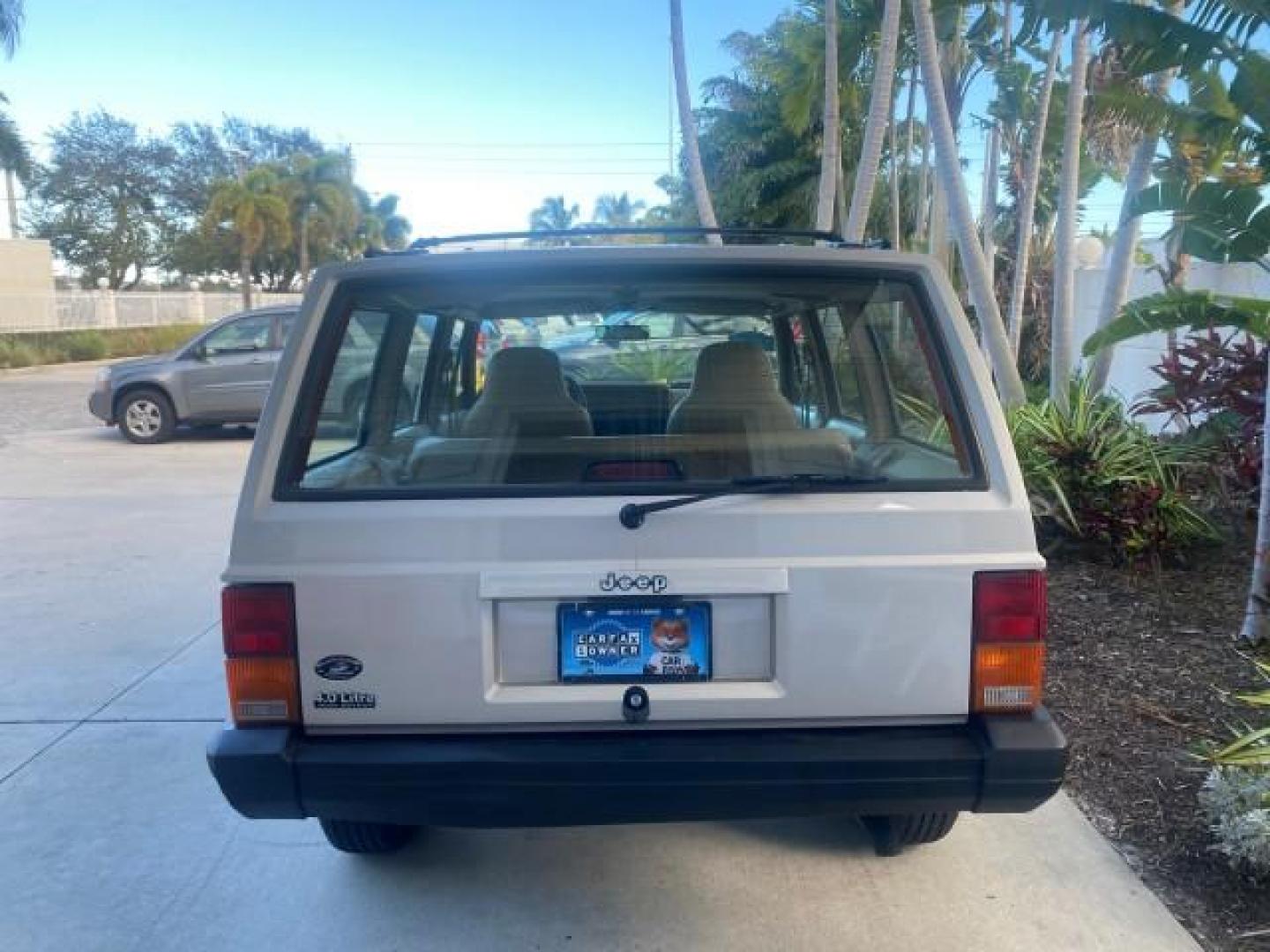 1996 Stone White (CC) /Dark Sand Jeep Cherokee Sport FL LOW MILES 77,388 4WD 4.0 6 CYL (1J4FJ68S2TL) with an 4.0L MPI I6 Engine engine, Automatic transmission, located at 4701 North Dixie Hwy, Pompano Beach, FL, 33064, (954) 422-2889, 26.240938, -80.123474 - OUR WEBPAGE FLORIDACARS1.COM HAS OVER 100 PHOTOS AND FREE CARFAX LINK 1996 JEEP CHEROKEE SPORT 4.0 6 CYL 4WD FL TITLE LOW MILES 77,388 VIN: 1J4FJ68S2TL171877 1 J 4 F J 6 8 S 2 T L 1 7 1 8 7 7 4 DOOR WAGON/SPORT UTILITY 4.0L I6 F GASOLINE REAR WHEEL DRIVE W/ 4X4 Top Features Cloth Seats Basic Feature- Photo#84