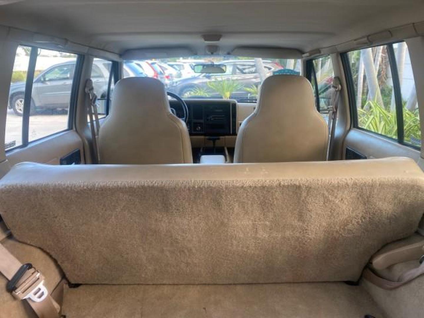 1996 Stone White (CC) /Dark Sand Jeep Cherokee Sport FL LOW MILES 77,388 4WD 4.0 6 CYL (1J4FJ68S2TL) with an 4.0L MPI I6 Engine engine, Automatic transmission, located at 4701 North Dixie Hwy, Pompano Beach, FL, 33064, (954) 422-2889, 26.240938, -80.123474 - OUR WEBPAGE FLORIDACARS1.COM HAS OVER 100 PHOTOS AND FREE CARFAX LINK 1996 JEEP CHEROKEE SPORT 4.0 6 CYL 4WD FL TITLE LOW MILES 77,388 VIN: 1J4FJ68S2TL171877 1 J 4 F J 6 8 S 2 T L 1 7 1 8 7 7 4 DOOR WAGON/SPORT UTILITY 4.0L I6 F GASOLINE REAR WHEEL DRIVE W/ 4X4 Top Features Cloth Seats Basic Feature- Photo#89