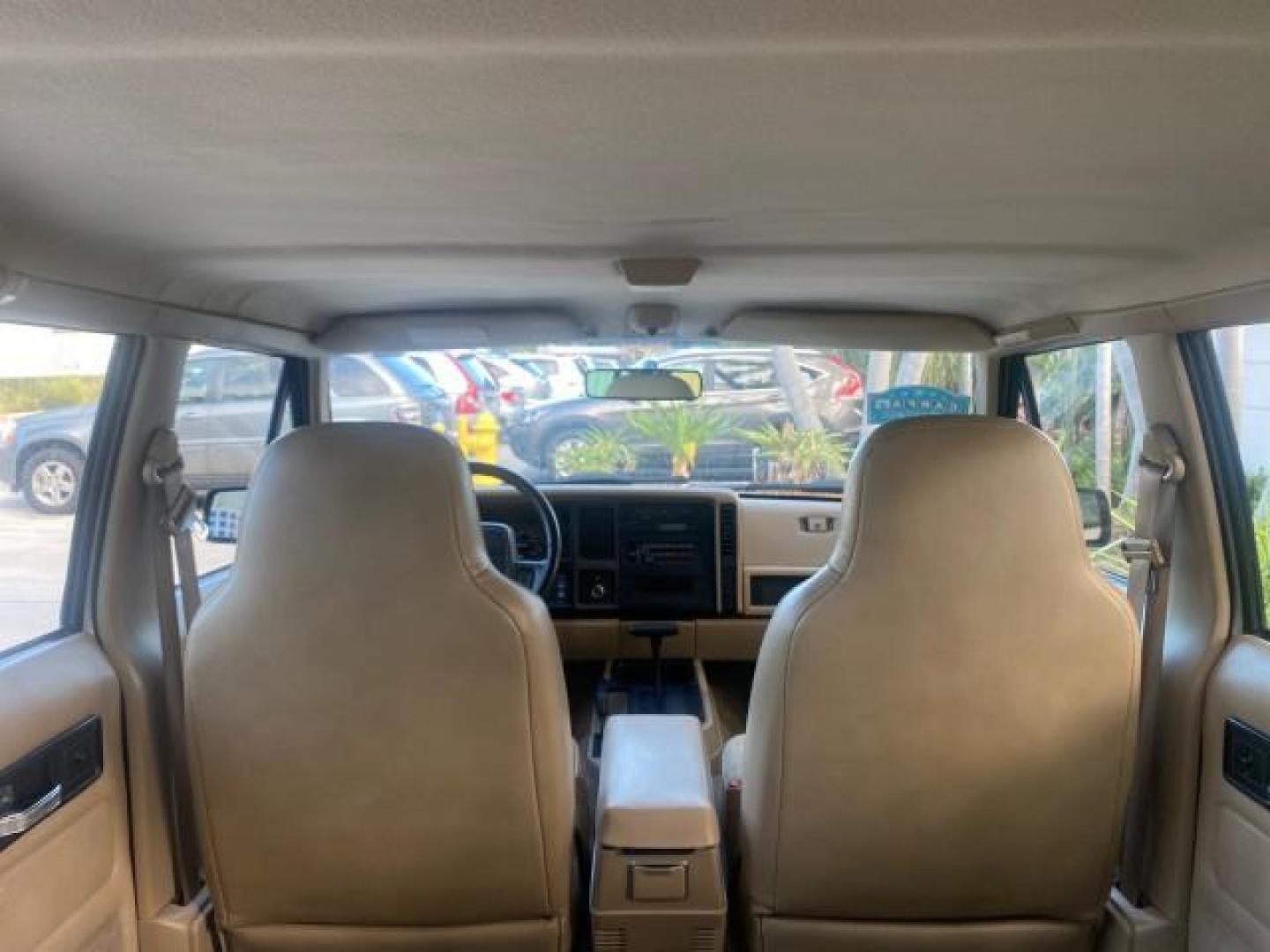 1996 Stone White (CC) /Dark Sand Jeep Cherokee Sport FL LOW MILES 77,388 4WD 4.0 6 CYL (1J4FJ68S2TL) with an 4.0L MPI I6 Engine engine, Automatic transmission, located at 4701 North Dixie Hwy, Pompano Beach, FL, 33064, (954) 422-2889, 26.240938, -80.123474 - OUR WEBPAGE FLORIDACARS1.COM HAS OVER 100 PHOTOS AND FREE CARFAX LINK 1996 JEEP CHEROKEE SPORT 4.0 6 CYL 4WD FL TITLE LOW MILES 77,388 VIN: 1J4FJ68S2TL171877 1 J 4 F J 6 8 S 2 T L 1 7 1 8 7 7 4 DOOR WAGON/SPORT UTILITY 4.0L I6 F GASOLINE REAR WHEEL DRIVE W/ 4X4 Top Features Cloth Seats Basic Feature- Photo#90