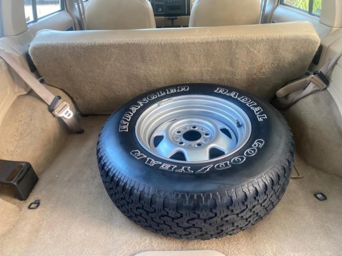 1996 Stone White (CC) /Dark Sand Jeep Cherokee Sport FL LOW MILES 77,388 4WD 4.0 6 CYL (1J4FJ68S2TL) with an 4.0L MPI I6 Engine engine, Automatic transmission, located at 4701 North Dixie Hwy, Pompano Beach, FL, 33064, (954) 422-2889, 26.240938, -80.123474 - OUR WEBPAGE FLORIDACARS1.COM HAS OVER 100 PHOTOS AND FREE CARFAX LINK 1996 JEEP CHEROKEE SPORT 4.0 6 CYL 4WD FL TITLE LOW MILES 77,388 VIN: 1J4FJ68S2TL171877 1 J 4 F J 6 8 S 2 T L 1 7 1 8 7 7 4 DOOR WAGON/SPORT UTILITY 4.0L I6 F GASOLINE REAR WHEEL DRIVE W/ 4X4 Top Features Cloth Seats Basic Feature- Photo#93