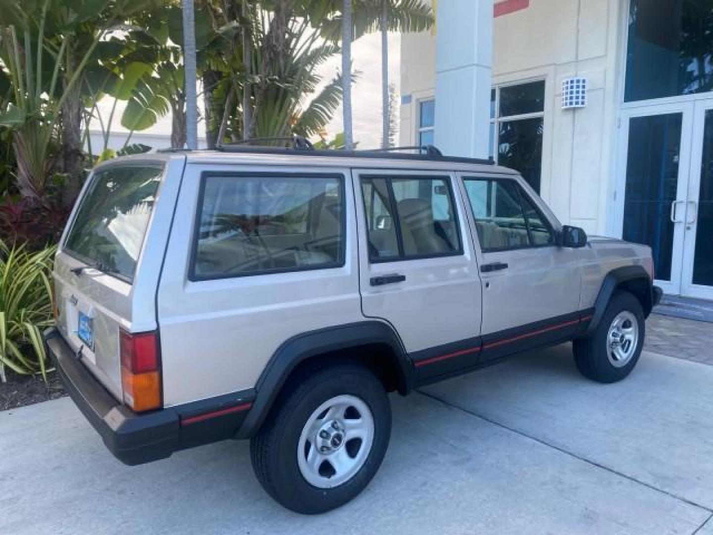 1996 Stone White (CC) /Dark Sand Jeep Cherokee Sport FL LOW MILES 77,388 4WD 4.0 6 CYL (1J4FJ68S2TL) with an 4.0L MPI I6 Engine engine, Automatic transmission, located at 4701 North Dixie Hwy, Pompano Beach, FL, 33064, (954) 422-2889, 26.240938, -80.123474 - OUR WEBPAGE FLORIDACARS1.COM HAS OVER 100 PHOTOS AND FREE CARFAX LINK 1996 JEEP CHEROKEE SPORT 4.0 6 CYL 4WD FL TITLE LOW MILES 77,388 VIN: 1J4FJ68S2TL171877 1 J 4 F J 6 8 S 2 T L 1 7 1 8 7 7 4 DOOR WAGON/SPORT UTILITY 4.0L I6 F GASOLINE REAR WHEEL DRIVE W/ 4X4 Top Features Cloth Seats Basic Feature- Photo#98