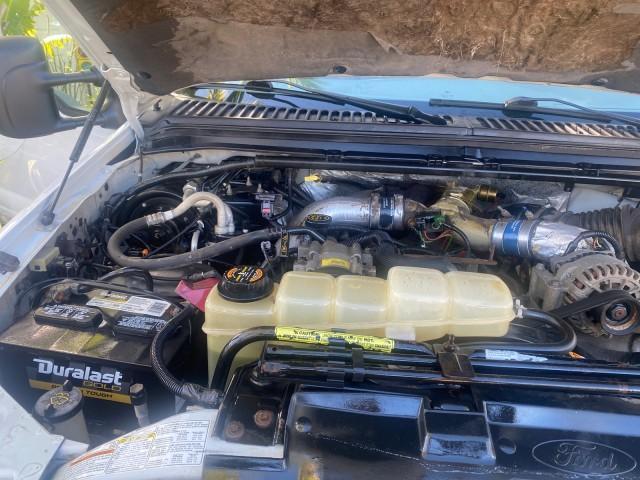 2001 Oxford White /Medium Graphite Ford Super Duty F-250 XLT 7.3 TURBO DIESEL 4WD (3FTNX21F41M) with an 7.3L DI V8 Turbo-Diesel Power Stroke Engine engine, Automatic transmission, located at 4701 North Dixie Hwy, Pompano Beach, FL, 33064, (954) 422-2889, 26.240938, -80.123474 - OUR WEBPAGE FLORIDACARS1.COM HAS OVER 100 PHOTOS AND FREE CARFAX LINK 2001 FORD F-250 SUPER DUTY XLT TURBO DIESEL ENGINE 4WD VIN: 3FTNX21F41MA06821 3 F T N X 2 1 F 4 1 M A 0 6 8 2 1 4 DOOR EXTENDED CAB PICKUP 7.3L V8 F DIESEL REAR WHEEL DRIVE W/ 4X4 Features 4WD/AWD ABS Brakes Air Conditioning AM/FM - Photo#24