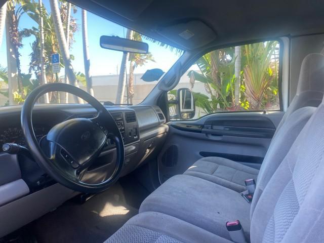 2001 Oxford White /Medium Graphite Ford Super Duty F-250 XLT 7.3 TURBO DIESEL 4WD (3FTNX21F41M) with an 7.3L DI V8 Turbo-Diesel Power Stroke Engine engine, Automatic transmission, located at 4701 North Dixie Hwy, Pompano Beach, FL, 33064, (954) 422-2889, 26.240938, -80.123474 - OUR WEBPAGE FLORIDACARS1.COM HAS OVER 100 PHOTOS AND FREE CARFAX LINK 2001 FORD F-250 SUPER DUTY XLT TURBO DIESEL ENGINE 4WD VIN: 3FTNX21F41MA06821 3 F T N X 2 1 F 4 1 M A 0 6 8 2 1 4 DOOR EXTENDED CAB PICKUP 7.3L V8 F DIESEL REAR WHEEL DRIVE W/ 4X4 Features 4WD/AWD ABS Brakes Air Conditioning AM/FM - Photo#46