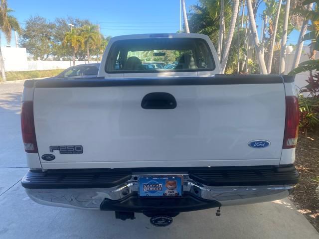 2001 Oxford White /Medium Graphite Ford Super Duty F-250 XLT 7.3 TURBO DIESEL 4WD (3FTNX21F41M) with an 7.3L DI V8 Turbo-Diesel Power Stroke Engine engine, Automatic transmission, located at 4701 North Dixie Hwy, Pompano Beach, FL, 33064, (954) 422-2889, 26.240938, -80.123474 - OUR WEBPAGE FLORIDACARS1.COM HAS OVER 100 PHOTOS AND FREE CARFAX LINK 2001 FORD F-250 SUPER DUTY XLT TURBO DIESEL ENGINE 4WD VIN: 3FTNX21F41MA06821 3 F T N X 2 1 F 4 1 M A 0 6 8 2 1 4 DOOR EXTENDED CAB PICKUP 7.3L V8 F DIESEL REAR WHEEL DRIVE W/ 4X4 Features 4WD/AWD ABS Brakes Air Conditioning AM/FM - Photo#85